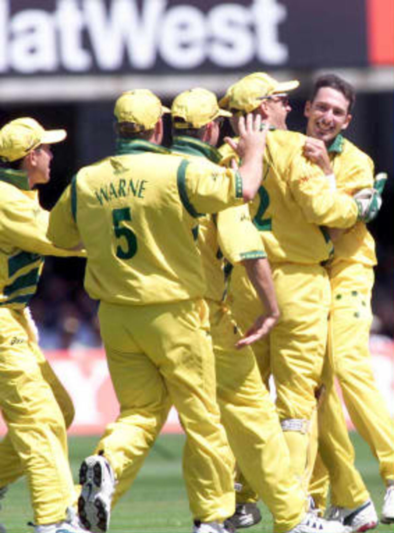 Australia celebrate the wicket of Saeed Anwar, who was bowled by Damien Fleming for 15 runs during the Cricket World Cup final at Lord's, London, 20 June 1999