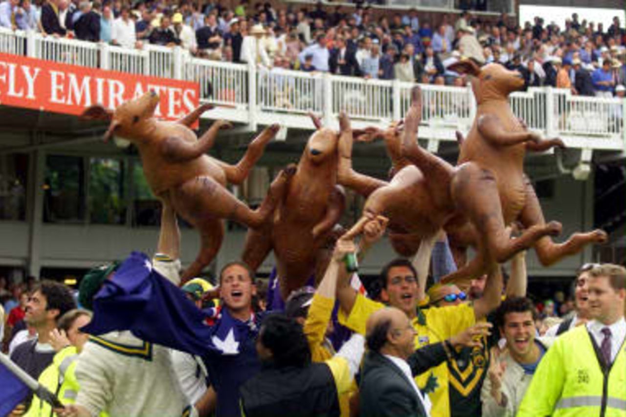 Australian fans hold up inflatable kangaroos as they celebrate australia winning the Cricket World Cup at Lords in London. Australia won by eight wickets. 20 June 1999