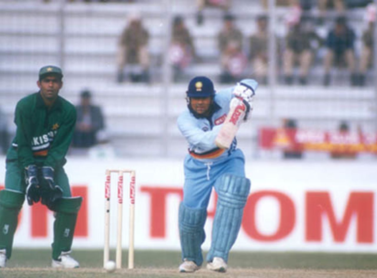 Going in for a well judged drive to mid off