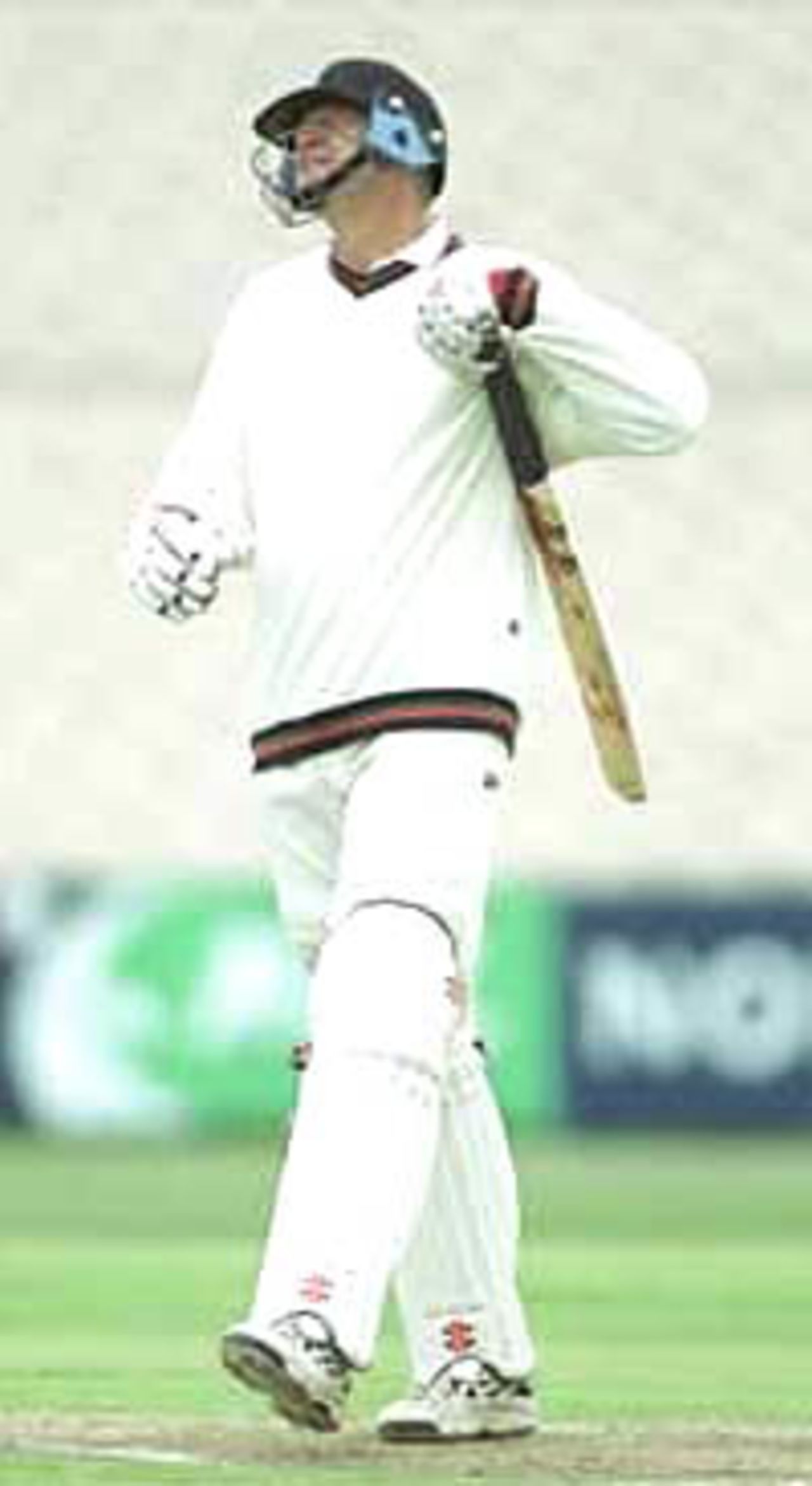 Peter Martin feels the pain after being hit on the hand off Dominic Cork, PPP healthcare County Championship Division One, 2000, Lancashire v Derbyshire, Old Trafford, Manchester, 31May-03Jun 2000 (Day 2).