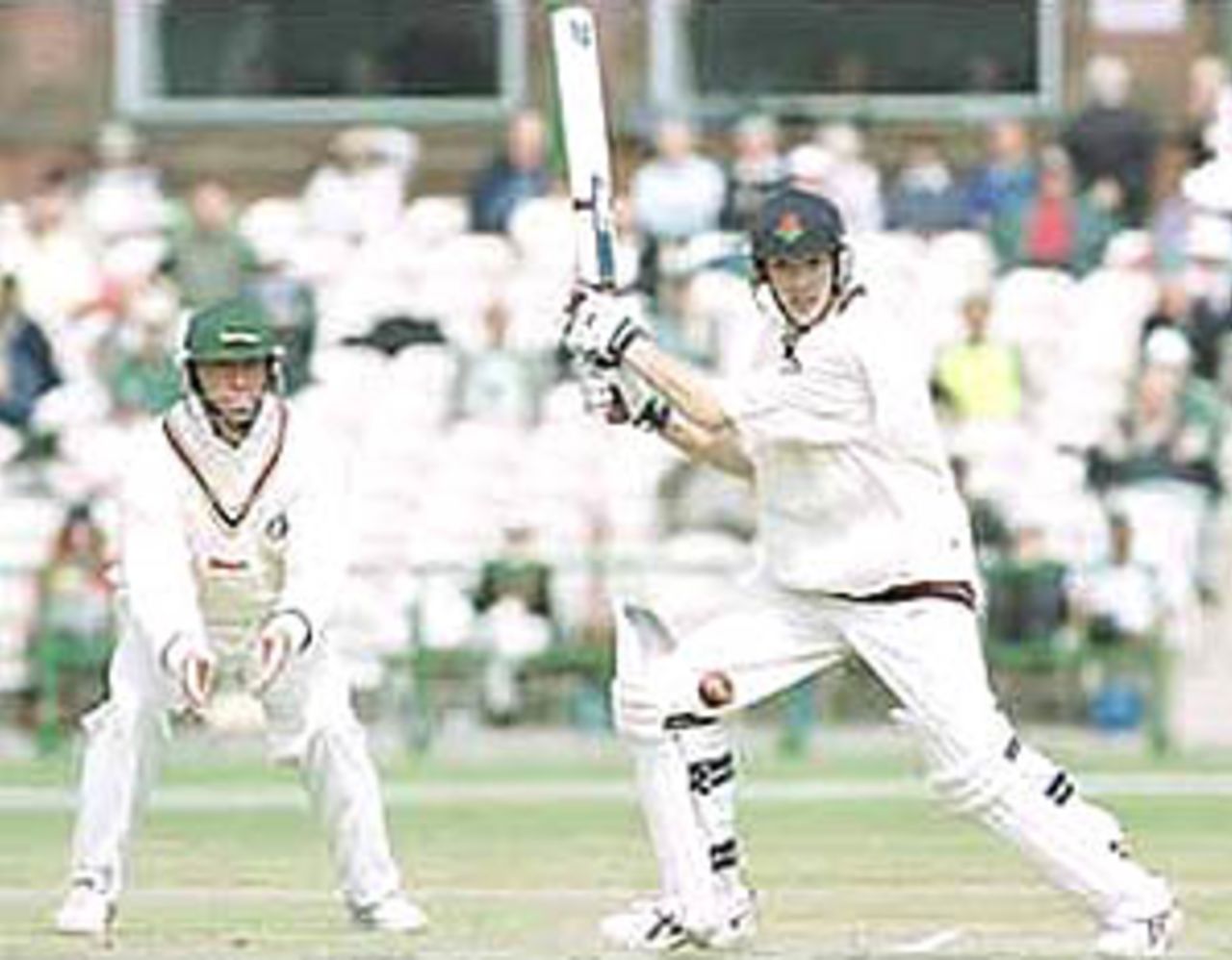 Chris Schofield plays a square cut as Trevor looks on, PPP healthcare County Championship Division One, 2000, Lancashire v Leicestershire Old Trafford, Manchester, 3-6 May 2000.