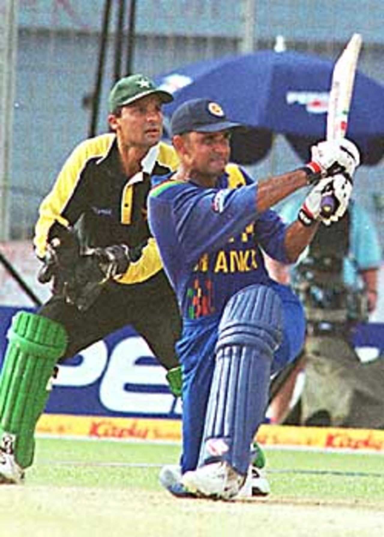 Atapattu heaves over mid wicket as Moin Khan watches, Asia Cup, 1999/00, 6th Match, Pakistan v Sri Lanka, Bangabandhu National Stadium, Dhaka, 5 June 2000.