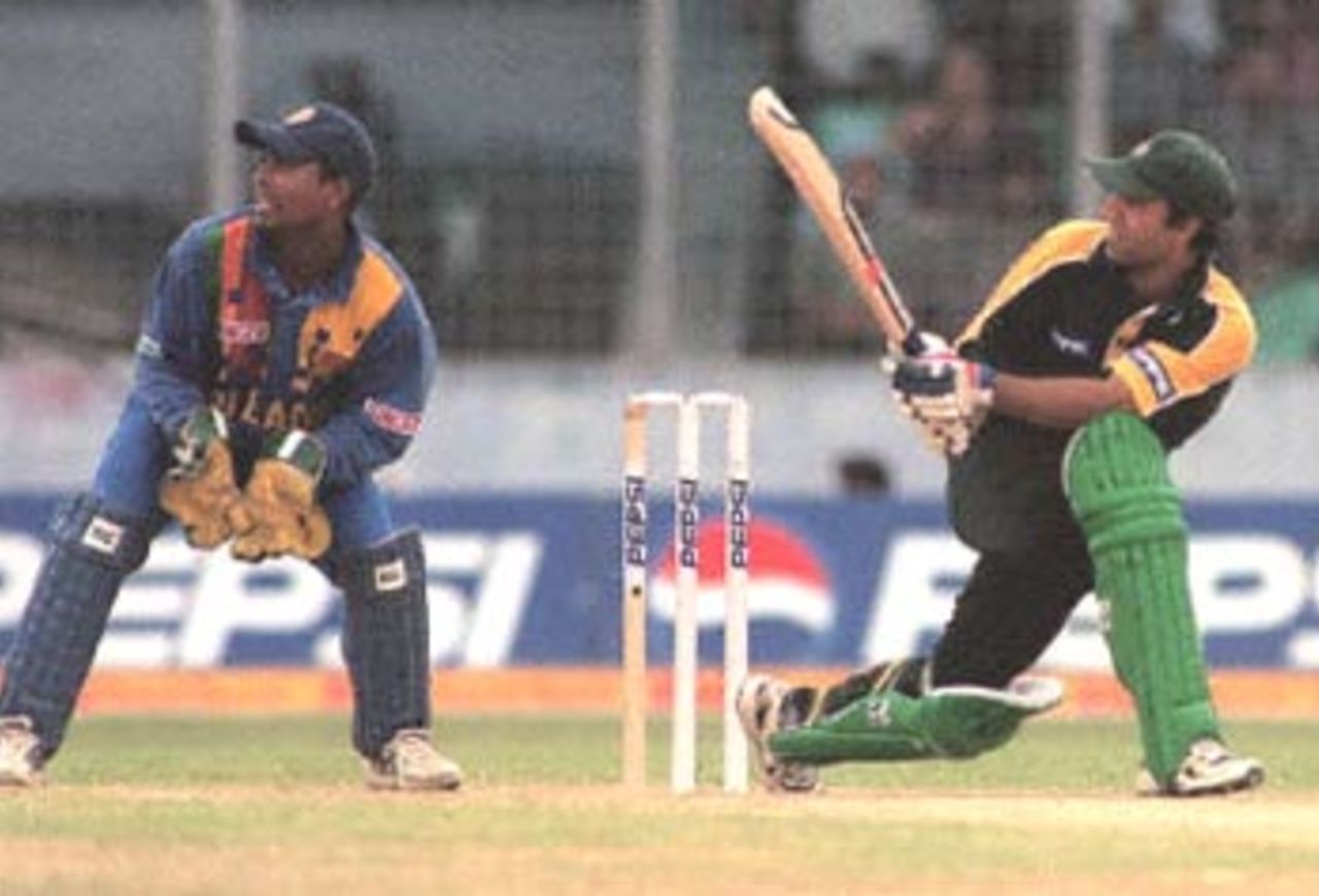 Pakistani batsman Saeed Anwar looks at the ball he swept past Sri Lankan wicketkeeper Romesh Kaluwitharana in the final match of the Asia Cup cricket in Dhaka. Anwar scored 82 off 155 balls helping his team to 277 runs off 50 overs against Sri Lanka. Asia Cup 1999/00, Final, Pakistan v Sri Lanka, Bangabandhu National Stadium, Dhaka 07 June 2000.