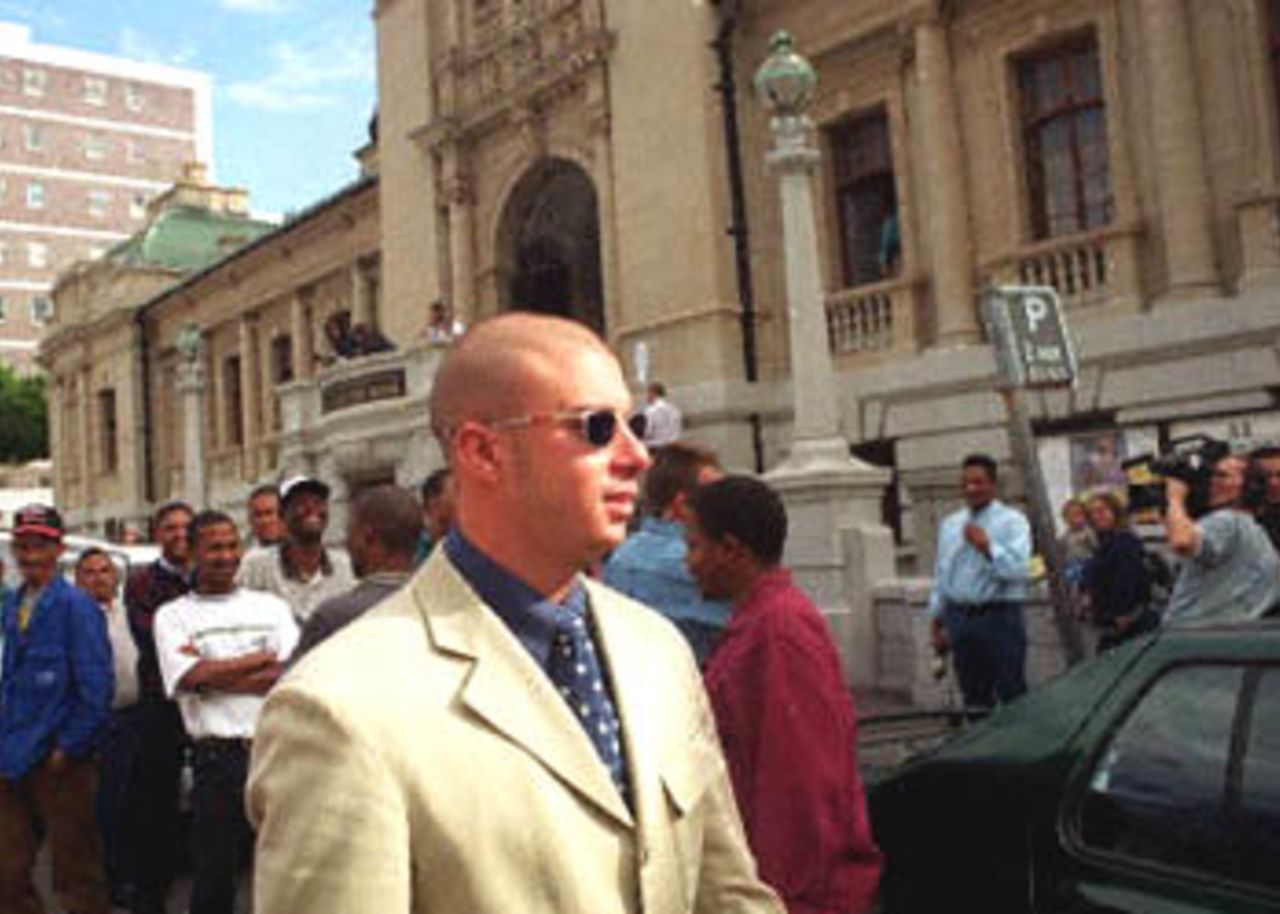 South African opening batsman Herschelle Gibbs arrives at The Home of the Book in Cape Town, the venue for the King Commission. Gibbs was to give evidence here into corruption in South African cricket. Gibbs was the subject of a conversat ion taped by Indian police in March when sacked South African captain Hansie Cronje appeared to tell bookmaker Sanjiv Chawla that Gibbs would make 'less tan 20' runs in a one-day international in Faribadad, India.