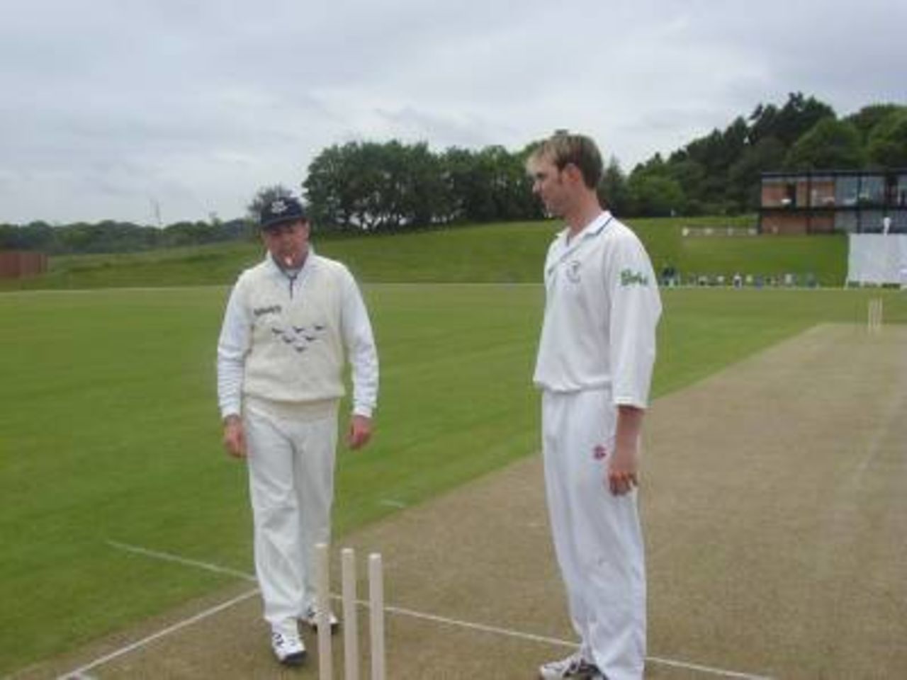 Lee Savident (Hampshire) and Keith Greenfield (Sussex) toss for choice of innings