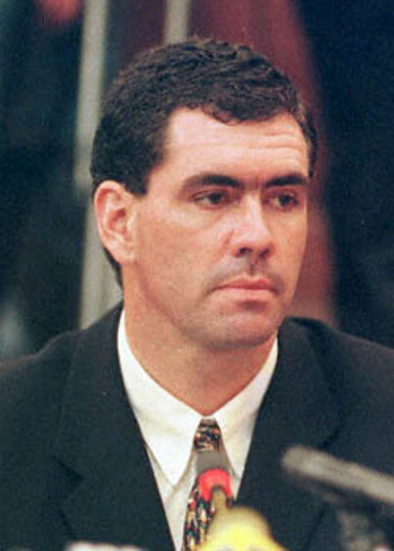 Former South African cricket captain Hansie Cronje looks pensive after testifying before the King Commission of Inquiry into allegations of cricket match-fixing in Cape Town 15 June 2000. Cronje confessed to pocketing large sums of money during a five-year flirtation with bookmakers and vowed that he would not play representative cricket again as punishment.