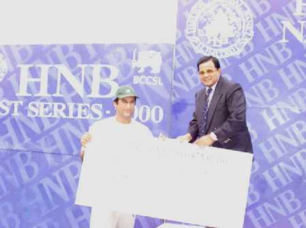 Man of the Match Wasim Akram receiving his cheque, 1st Test Pakistan v Sri Lanka, 14-18 June 2000