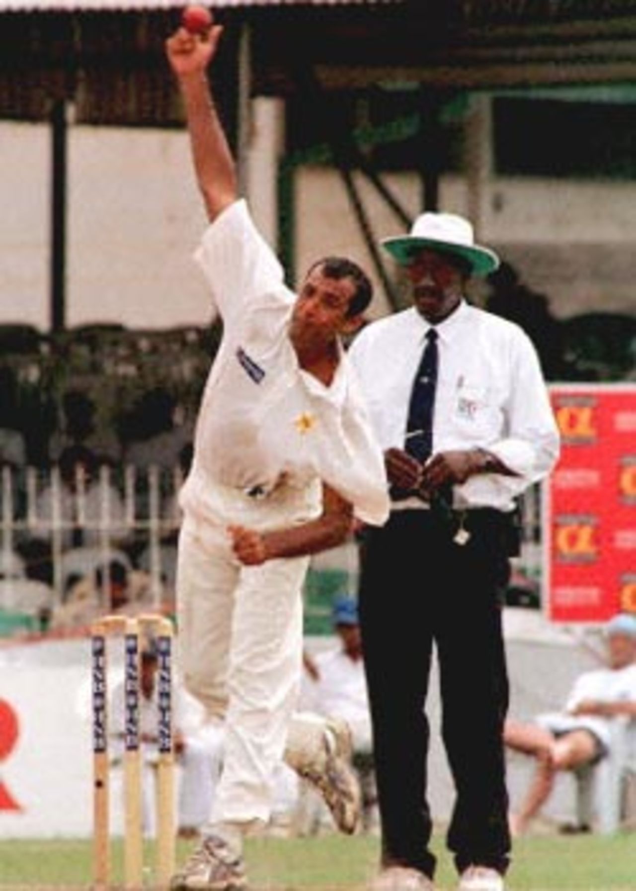 Pakistan bowler Arshad Khan on his way to collecting three wickets in the first test against Sri Lanka. Pakistan won by five wickets with a full day's play to spare. Pakistan in Sri Lanka, 1999/00, 1st Test, Sri Lanka v Pakistan, Sinhalese Sports Club Ground, Colombo 14-18 June 2000 (Day 4).