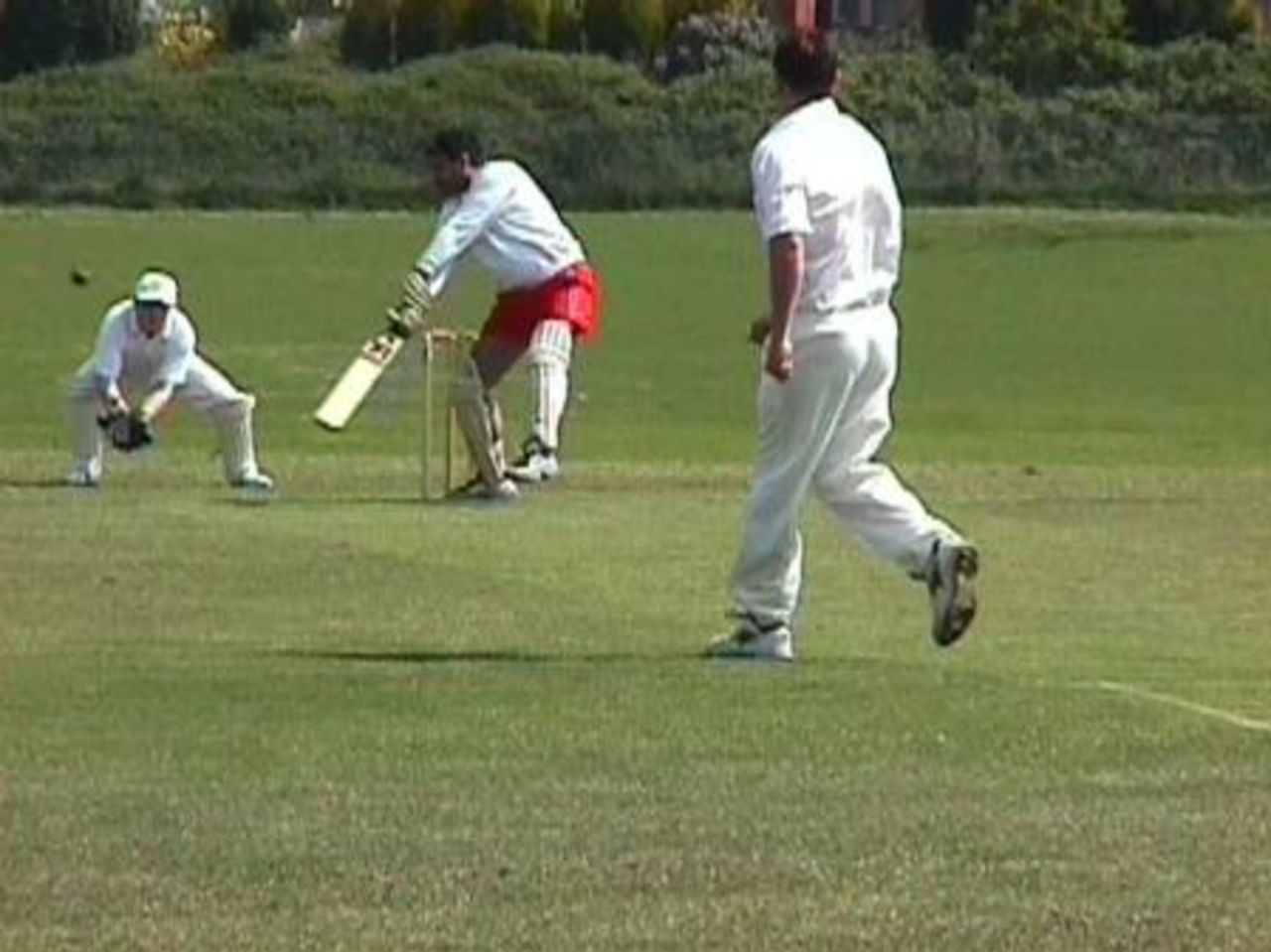 Millennium's opening batsman Mohammed Pervez cuts the first ball of the Millennium Season from Accrington A's Paul Walsh for four at Highams