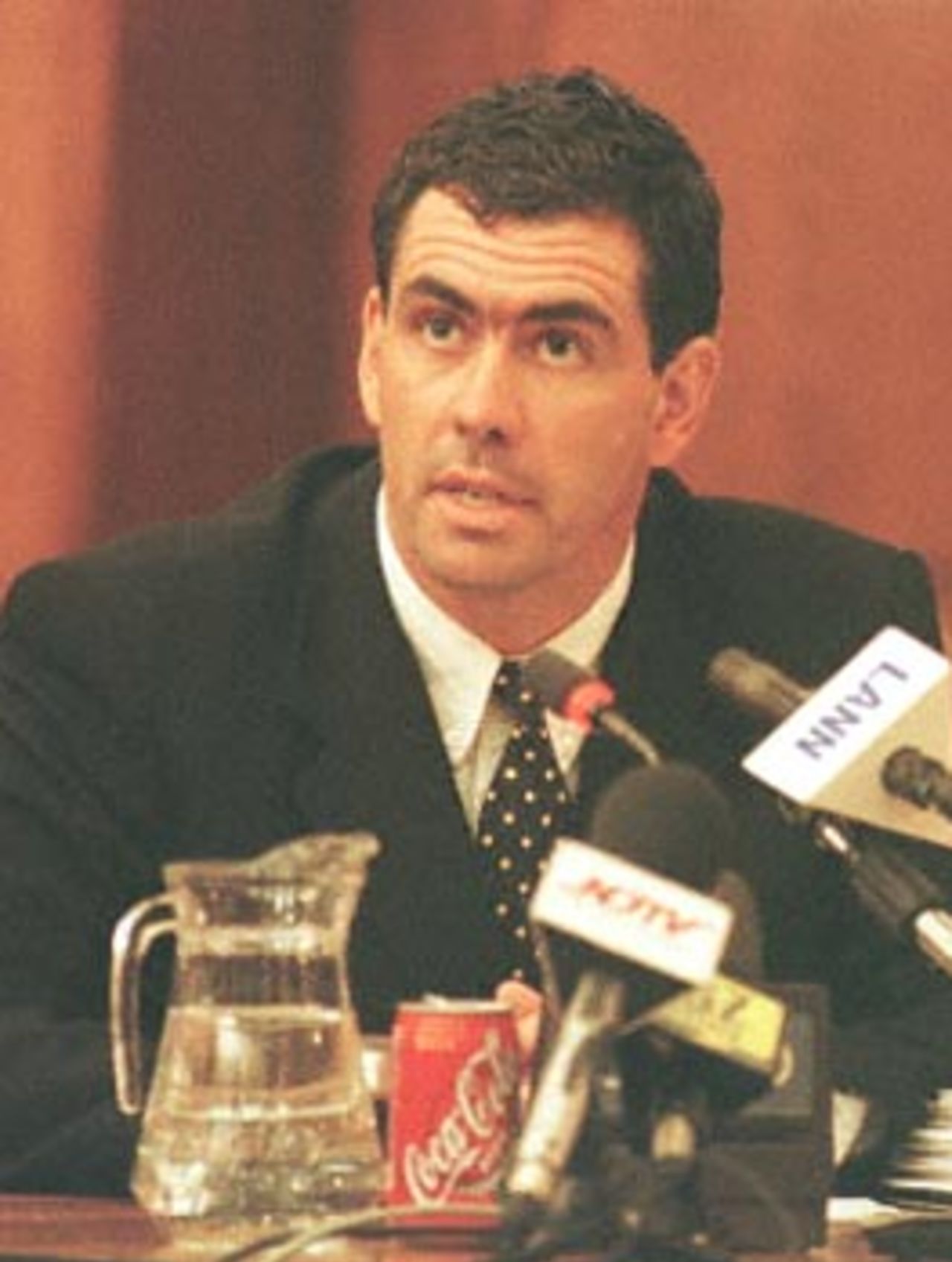 Former South African cricket captain Hansie Cronje speaks during cross-examination at the King Commission of Inquiry into allegations of cricket match-fixing in Cape Town 21 June 2000.