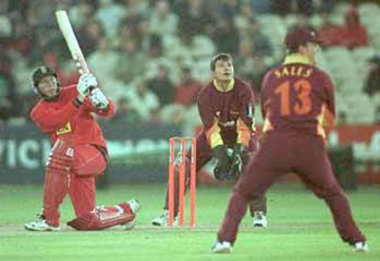 Atherton lofts the ball over mid-wicket, National League Division One, 2000, Lancashire v Northamptonshire, Old Trafford, Manchester, 23 June 2000.