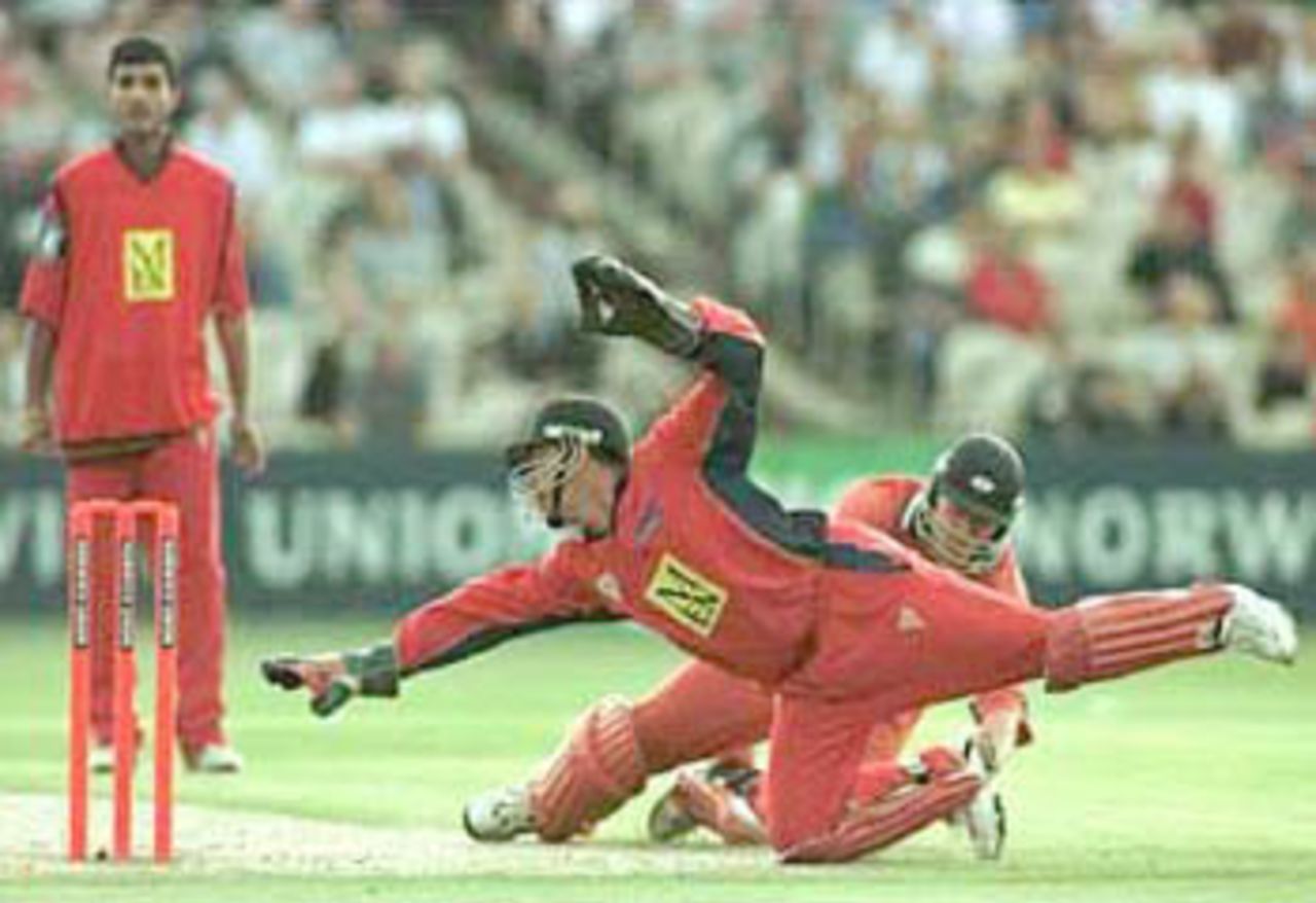 Warren Hegg dives in vain to run David Byas out, National League Division One, 2000, Lancashire v Yorkshire, Old Trafford, Manchester, 27 June 2000.