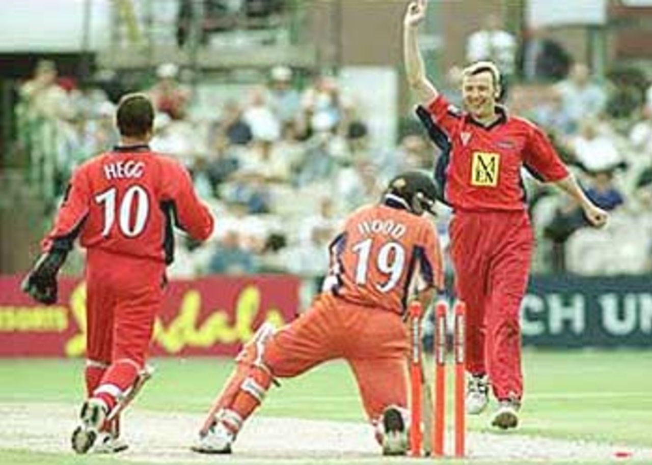Chris Schofield celebrates on picking up the wicket of Matthew Wood, National League Division One, 2000, Lancashire v Yorkshire, Old Trafford, Manchester, 27 June 2000.