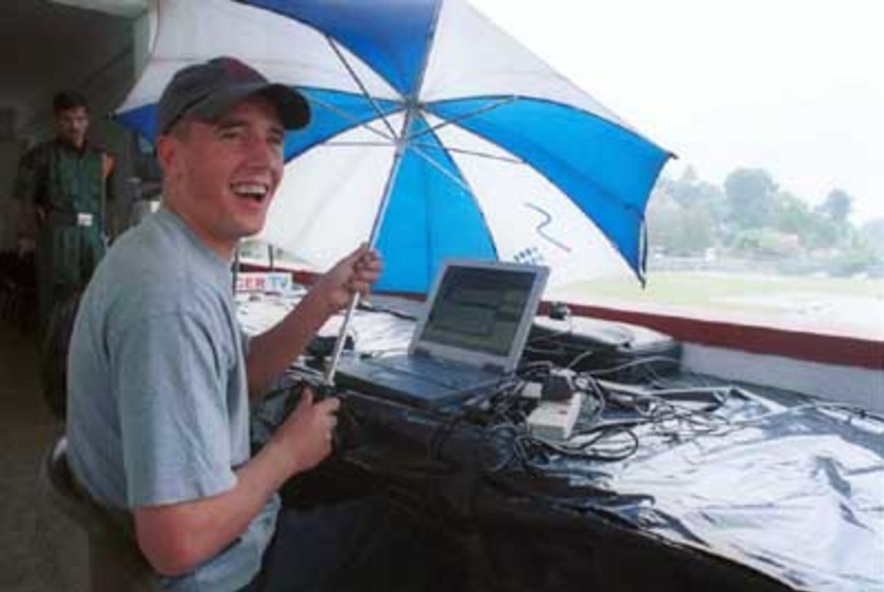 Charlie at work!!! as ground staff collect water from covers during the third day of the third cricket Test between Sri Lanka and Pakistan in Asgiriya International cricket stadium in Kandy, Sri Lanka on Friday, June. 30, 2000