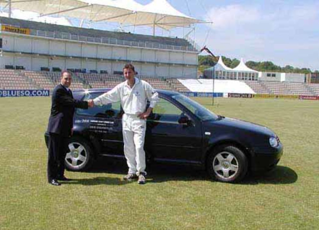 Giles White receives the keys to his sponsored car, a Volkswagen from Paul Ancell of Exbury Developments Limited.