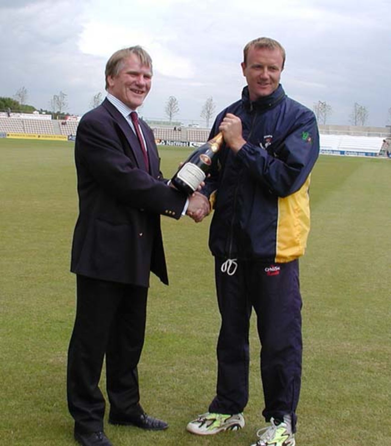 Shaun Udal receives a magnum of Laurent Perrier champagne for his match winning Seven for 74 against Derbyshire, from Mr.Charles Ridler of Laurent Perrier.