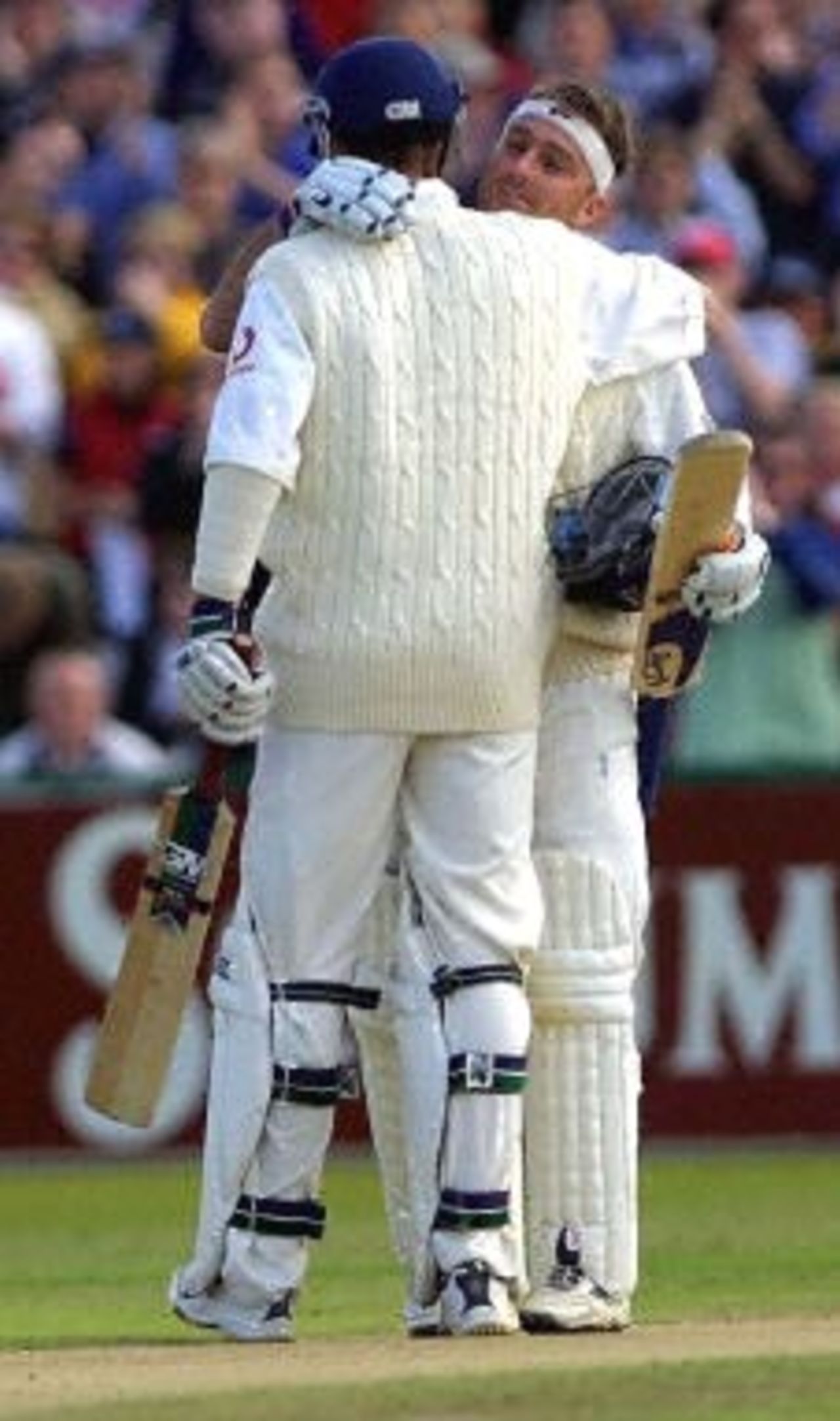 Michael Vaughan congratulates Graham Thorpe on his century, day 3, 2nd Test at Old Trafford, 17-21 May 2001.