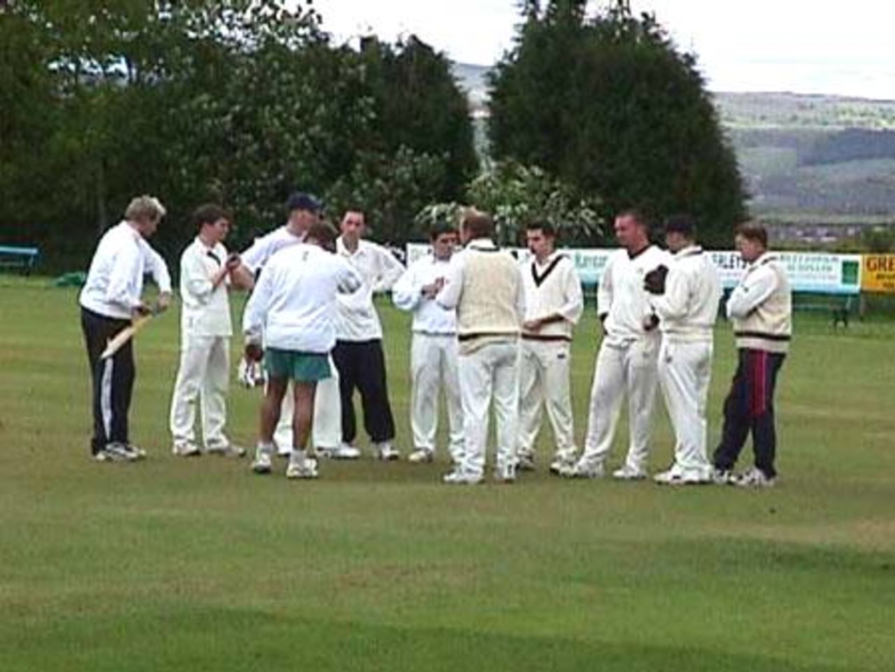 Settle captain Andrew Davidson gives his team a pre-match talk