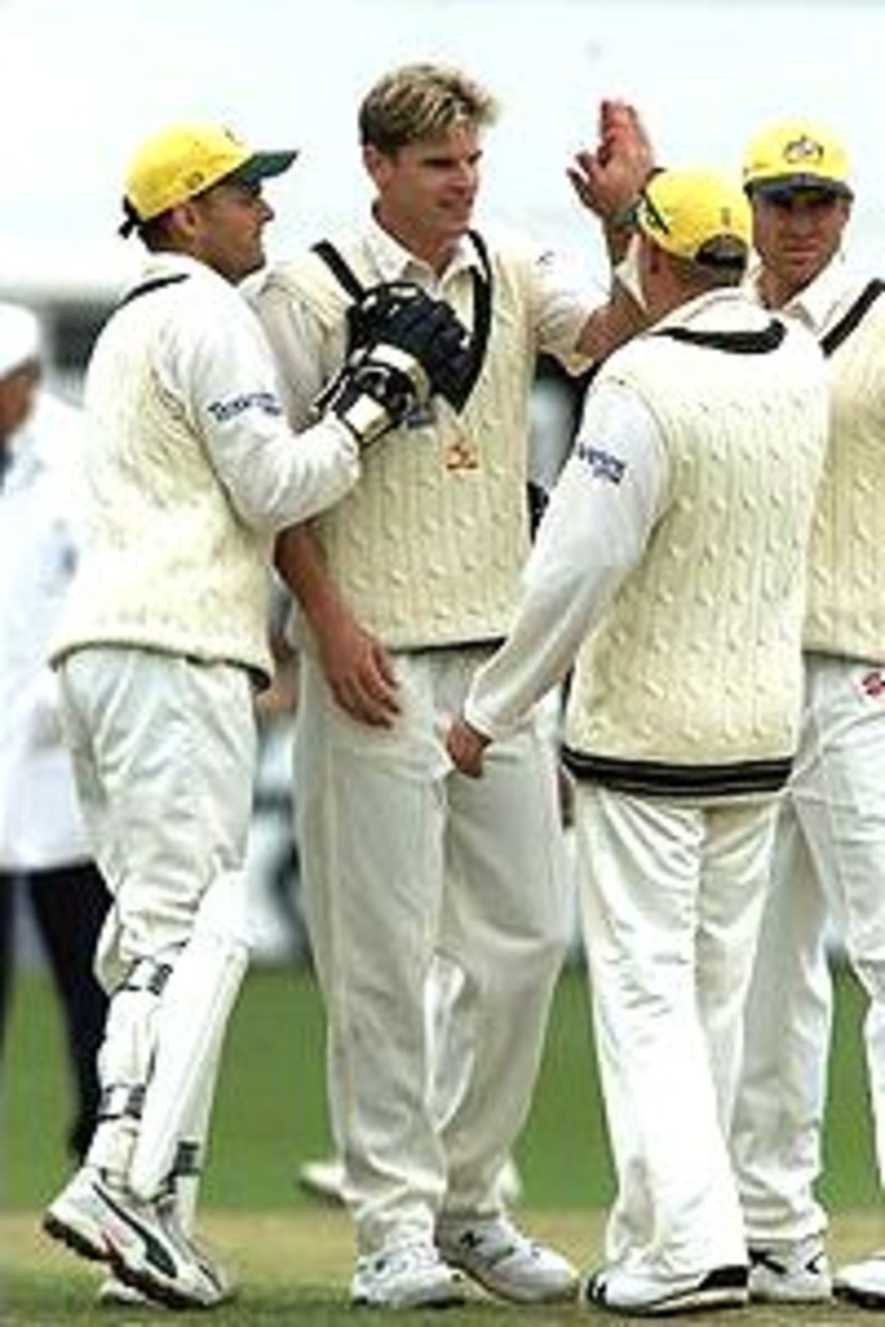 Nathan Bracken of Australia celebrates with team mates after claiming the wicket of David Leatherdale of Worcestershire, caught by Adam Gilchrist for 22, during day two of the tour match between Worcestershire and Australia played at New Road, Worcester, England.