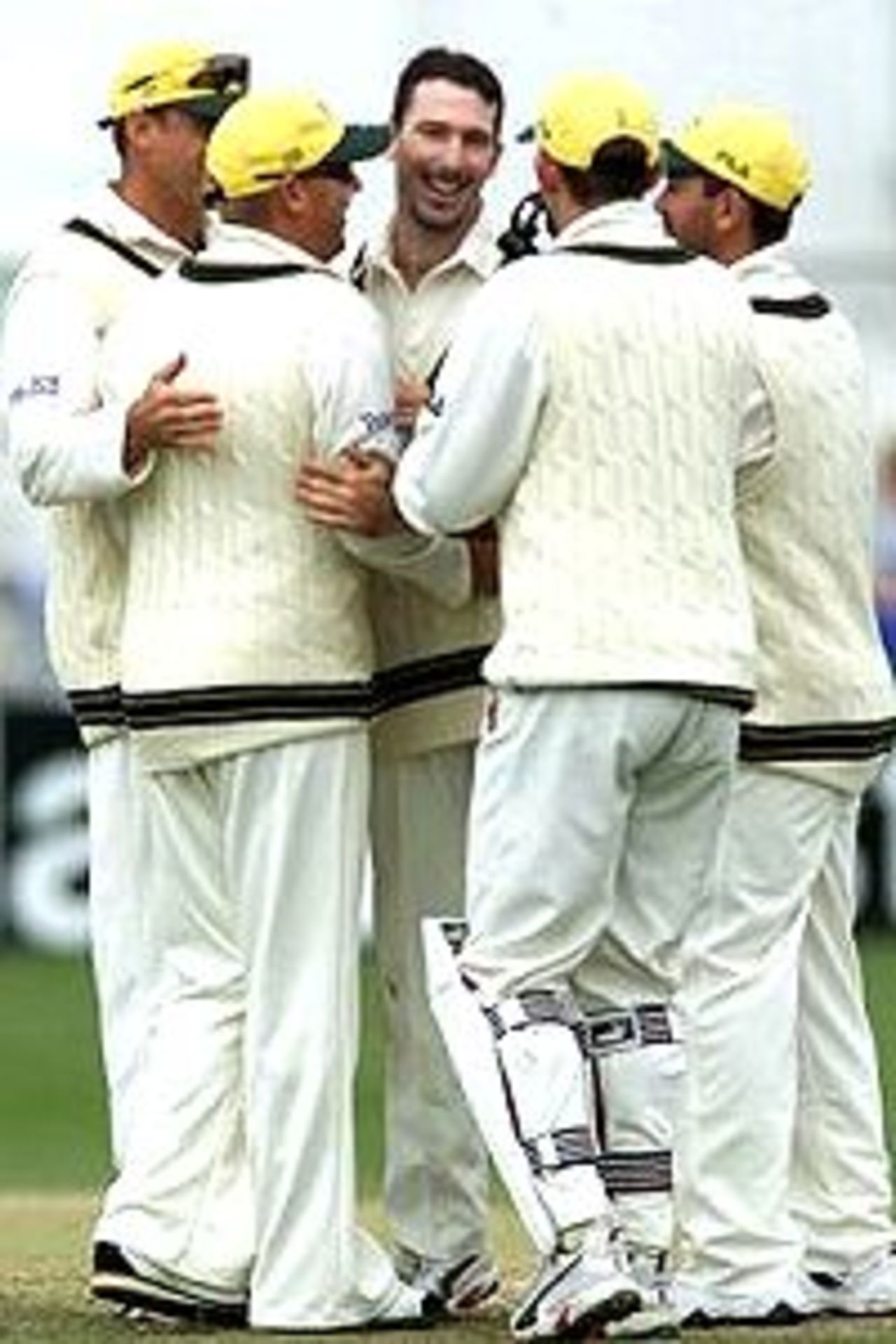 Damien Fleming of Australia is congratulated by team mates after dismissing Graeme Hick of Worcestershire, caught by Shane Warne of Australia for a duck, during day three of the tour match between Worcestershire and Australia played at New Road, Worcester, England.