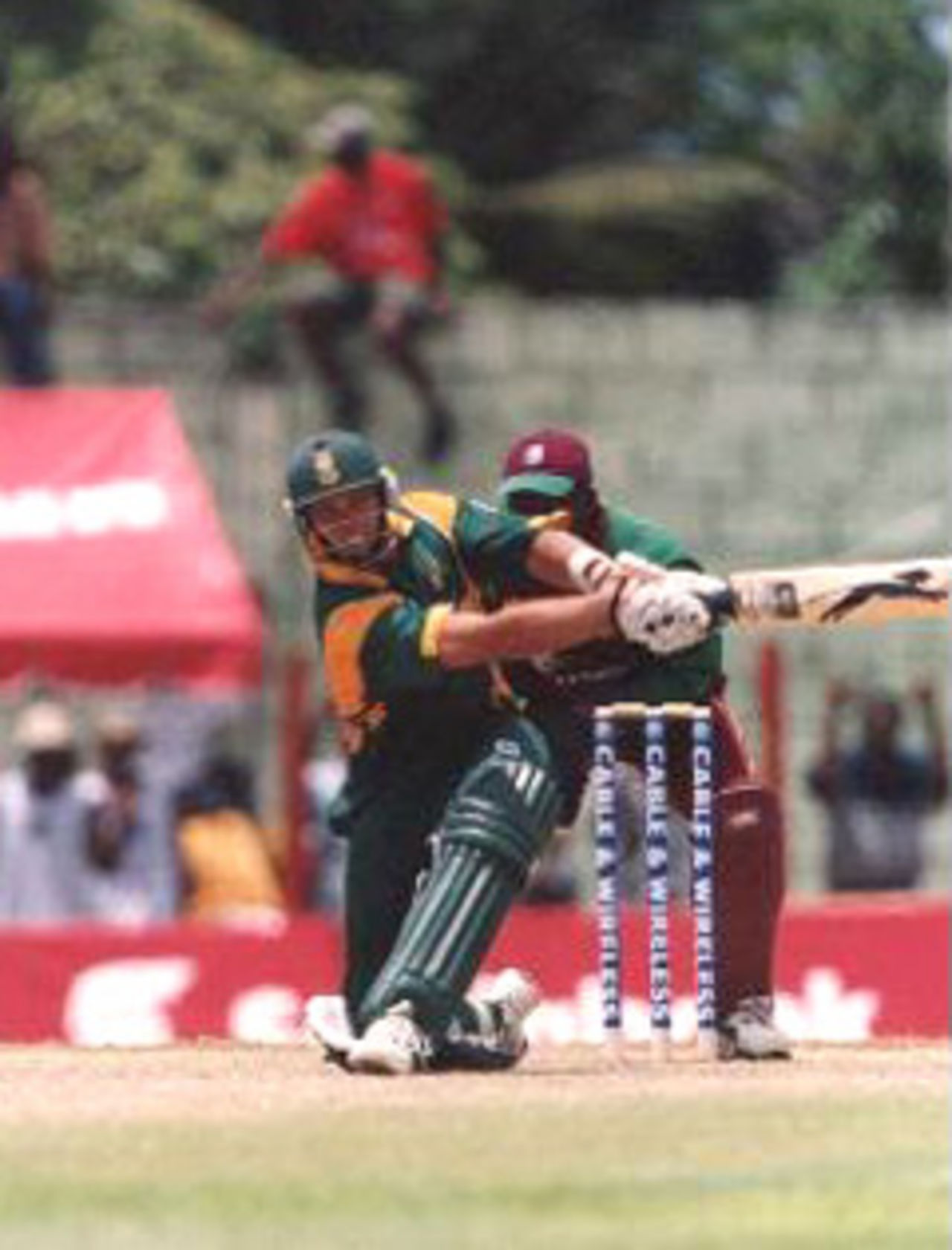 Jacques Kallis sweeps, 7th ODI West Indies v South Africa, at Arnos Vale Ground, Kingstown, St Vincent, 16 May 2001