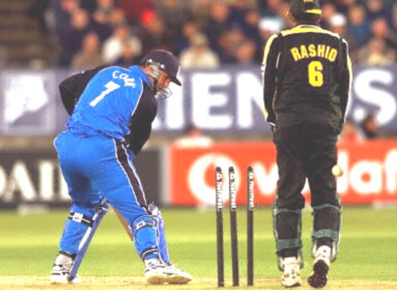 Dominic Cork looks back after being bowled by Shahid Afridi as Rashid Latif looks on, 1st ODI at Edgbaston, 7 June 2001.