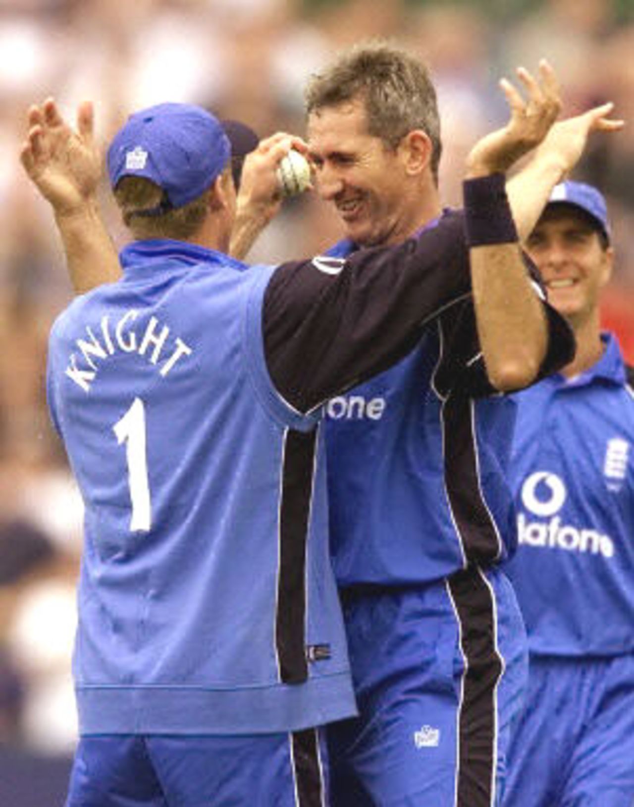 Andrew Caddick celebrates capturing the wicket of Ricky Ponting with Nick Knight and Michael Vaughan, 5th ODI at Old Trafford,14 June 2001.