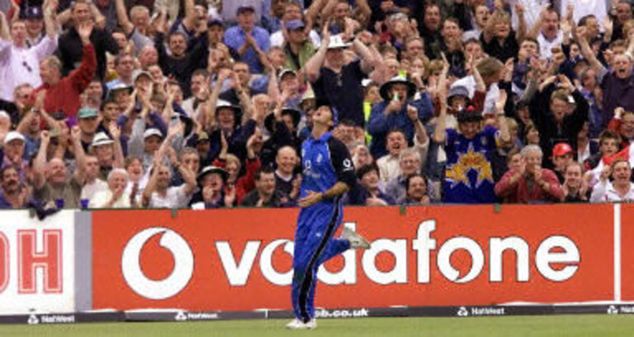 The crowds cheer as Michael Vaughan catches Andrew Symonds on the boundary, 5th ODI at Old Trafford,14 June 2001.