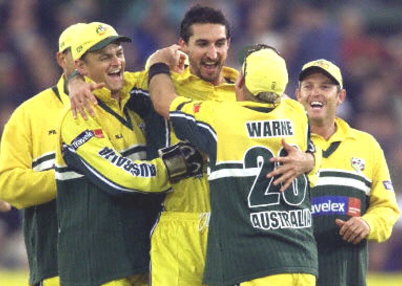Jason Gillespie celebrates with his teammates the wicket of Michael Vaughan, 5th ODI at Old Trafford,14 June 2001.