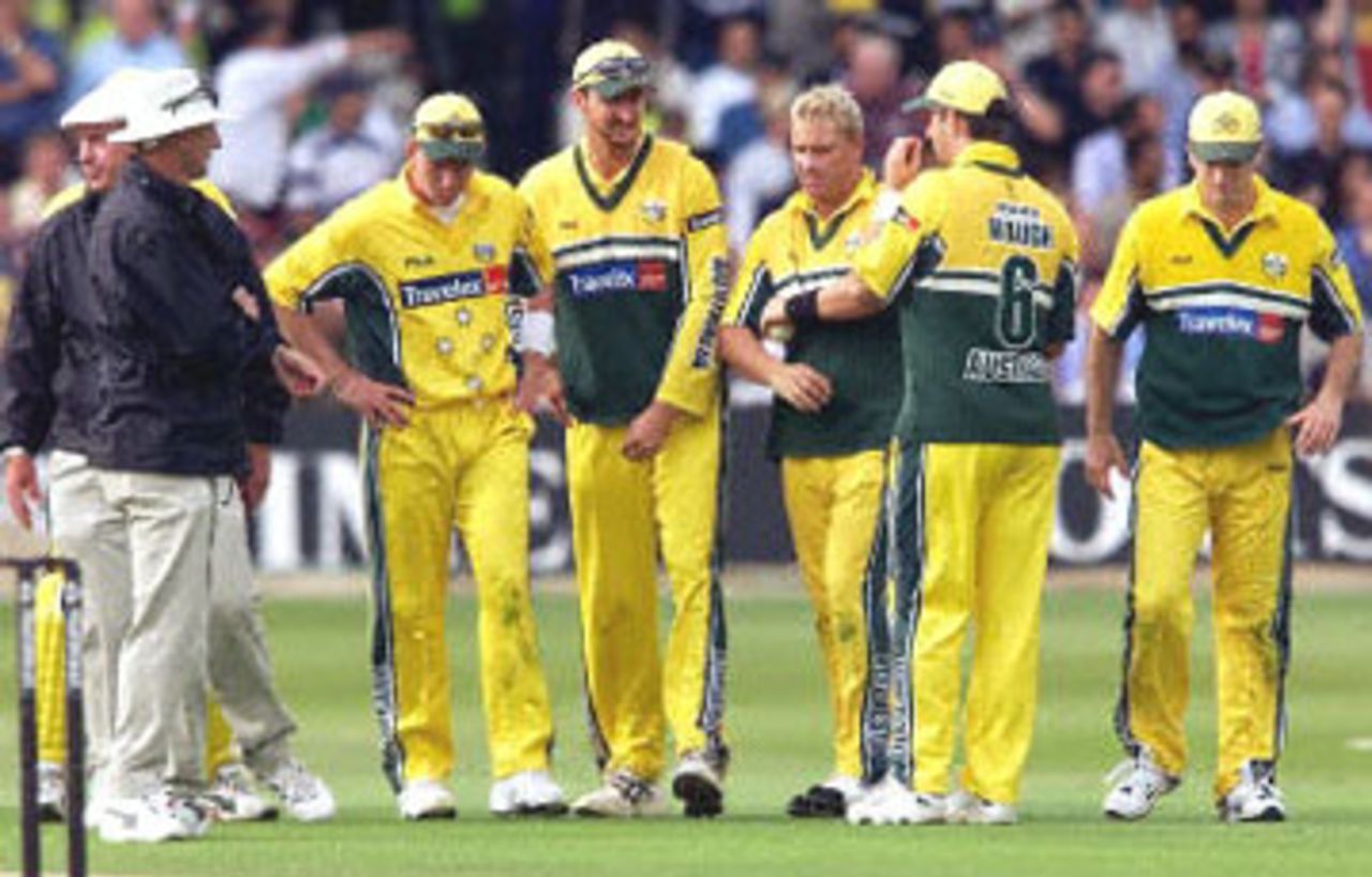 Steve Waugh leads his team off the field after missiles were thrown at his players, 8th ODI at Trent Bridge, 19 June 2001.