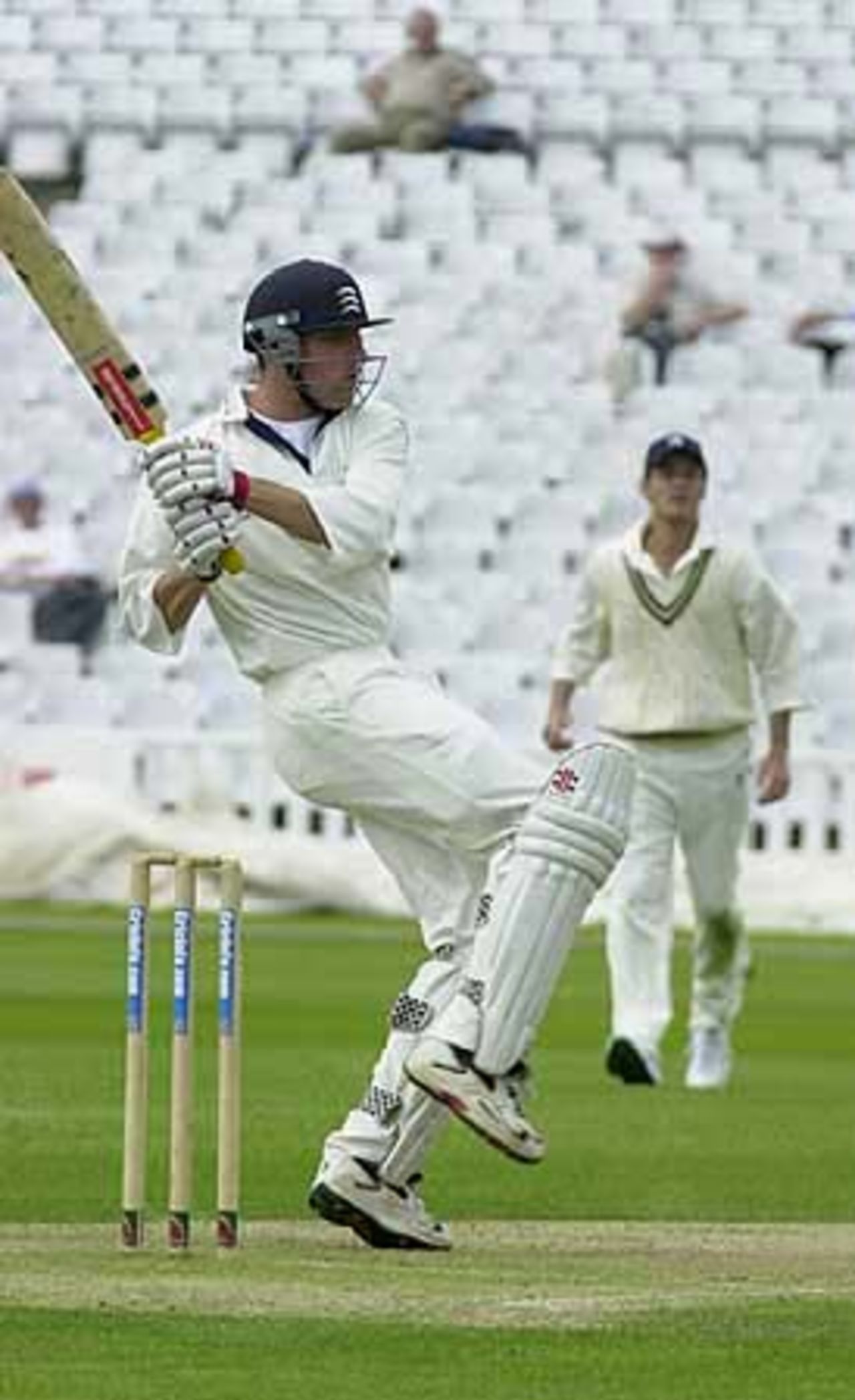Andrew Strauss pulls a ball for four off the bowling of Drakes
