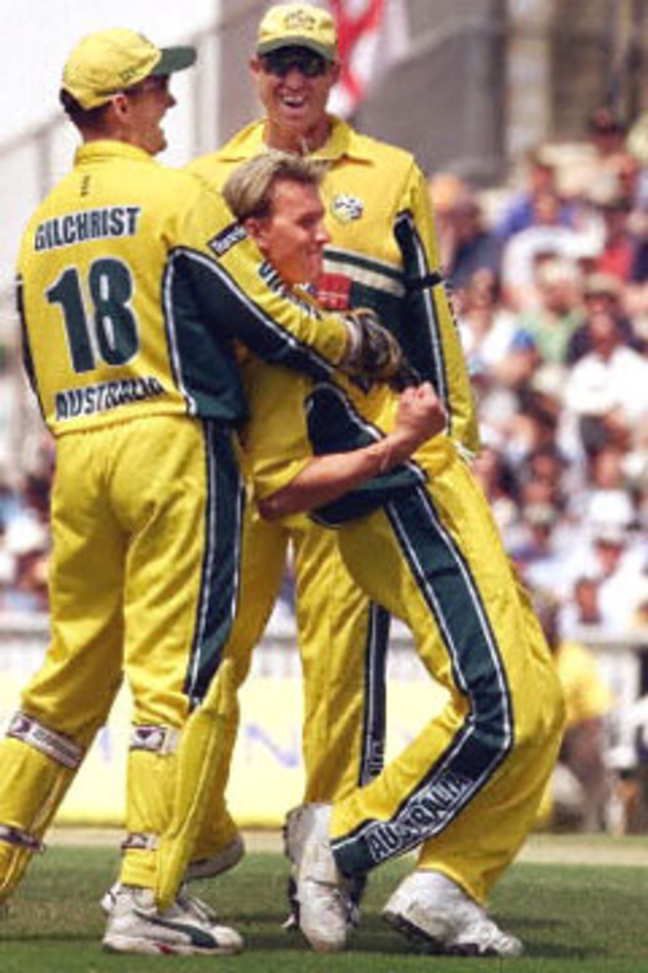 Brett Lee is hugged by Adam Gilchrist and  Matthew Hayden after dismissing Darren Gough for a golden duck, 9th ODI at the Oval, 21 June 2001.