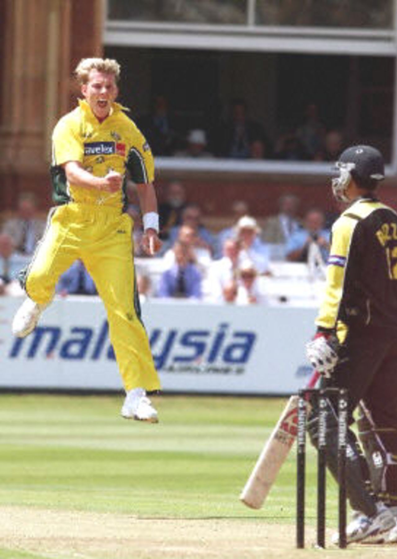 Brett Lee leaps high in the air celebrating the dismissal of Abdur Razzaq, final ODI at Lords, 23 June 2001.