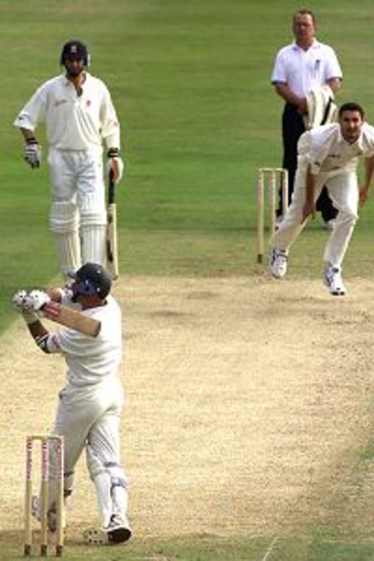 Nasser Hussain of Essex hits a six from the bowling of Jason Gillespie of Australia, during day one of the tour match between Essex and Australia, played at the County Ground, Chelmsford, England.