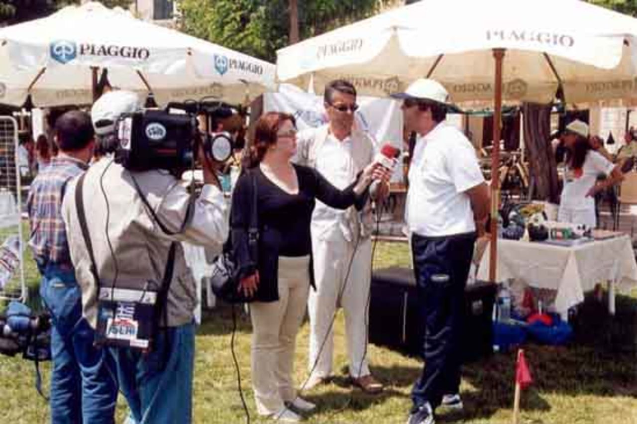 Akis Mazis talking to the local media