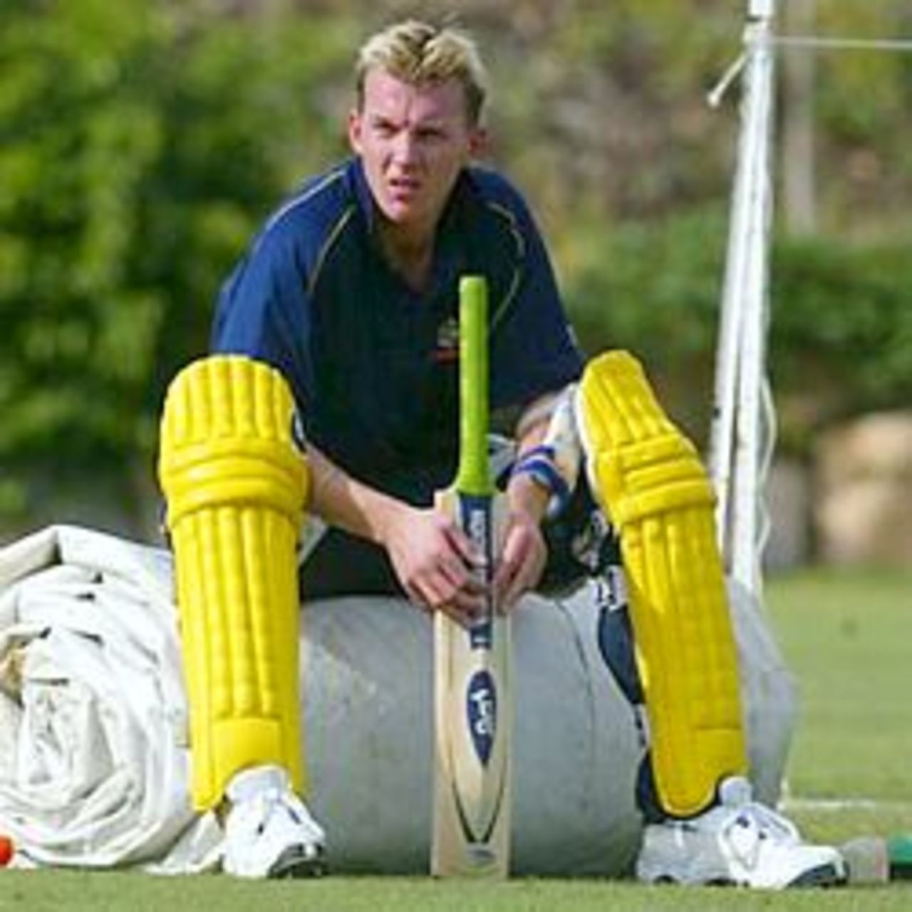 BRISBANE - JUNE 6: Brett Lee of Australia relaxes during a joint training session between the Australian Cricket side and the Queensland Bulls held at the Allan Border Oval in Brisbane, Australia on June 6, 2002.