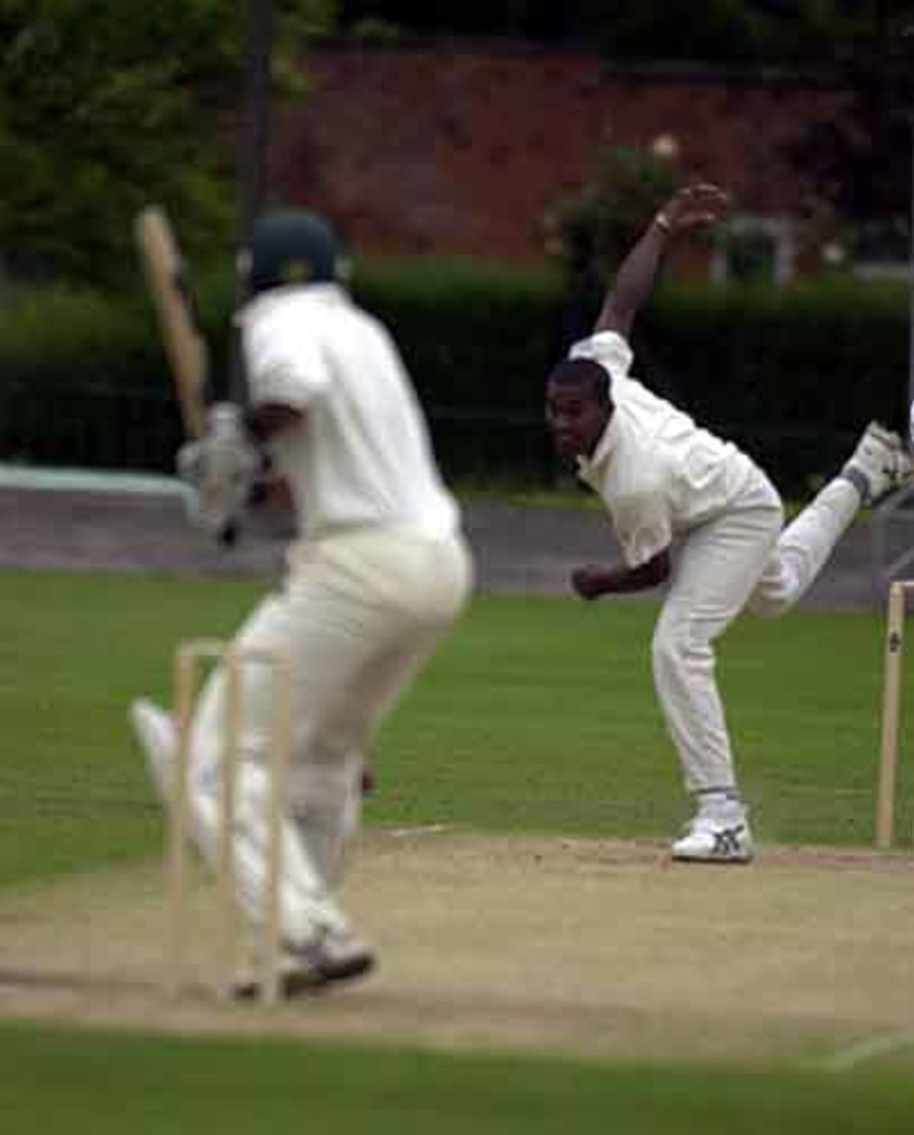 Perera hurls down a delivery to Usman Afzaal, MCC v Sri Lankans at Chesterfield, June 2002