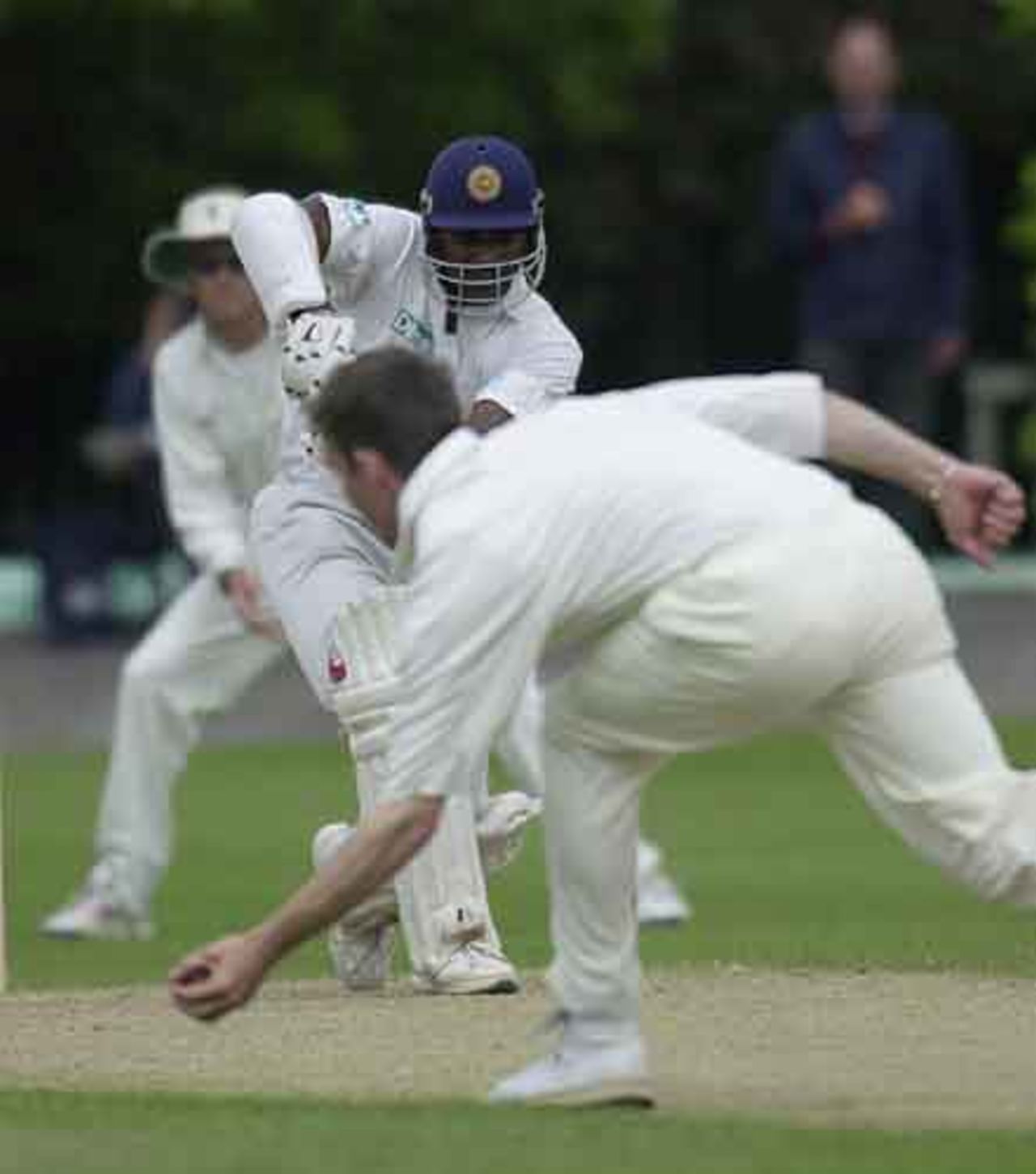 Jayasuriya drives but Kirtley manages to field off his own bowling, MCC v Sri Lankans at Chesterfield, June 2002