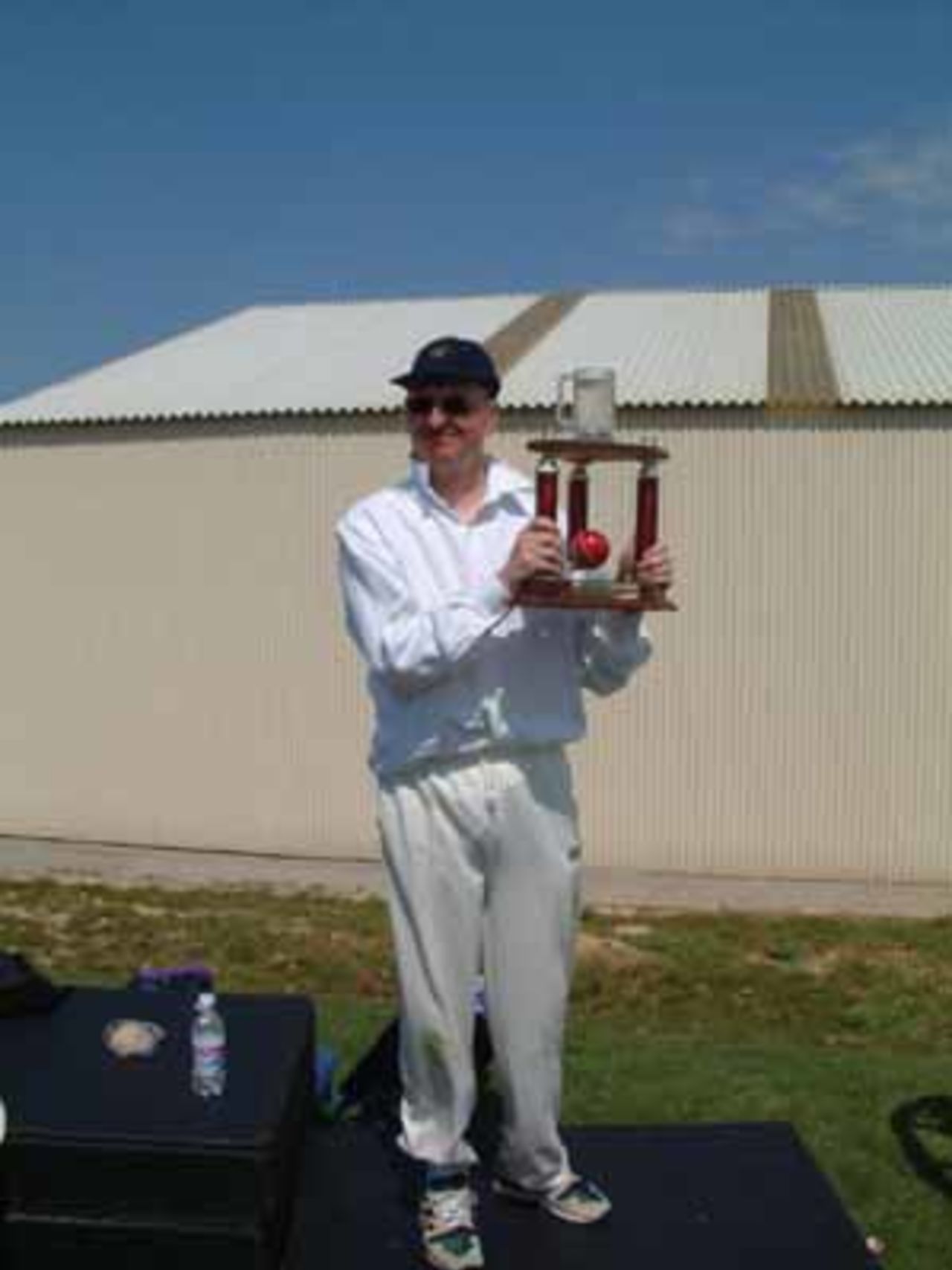 Tucker lifts the champions trophy, Spirt of Cricket weekend 2002