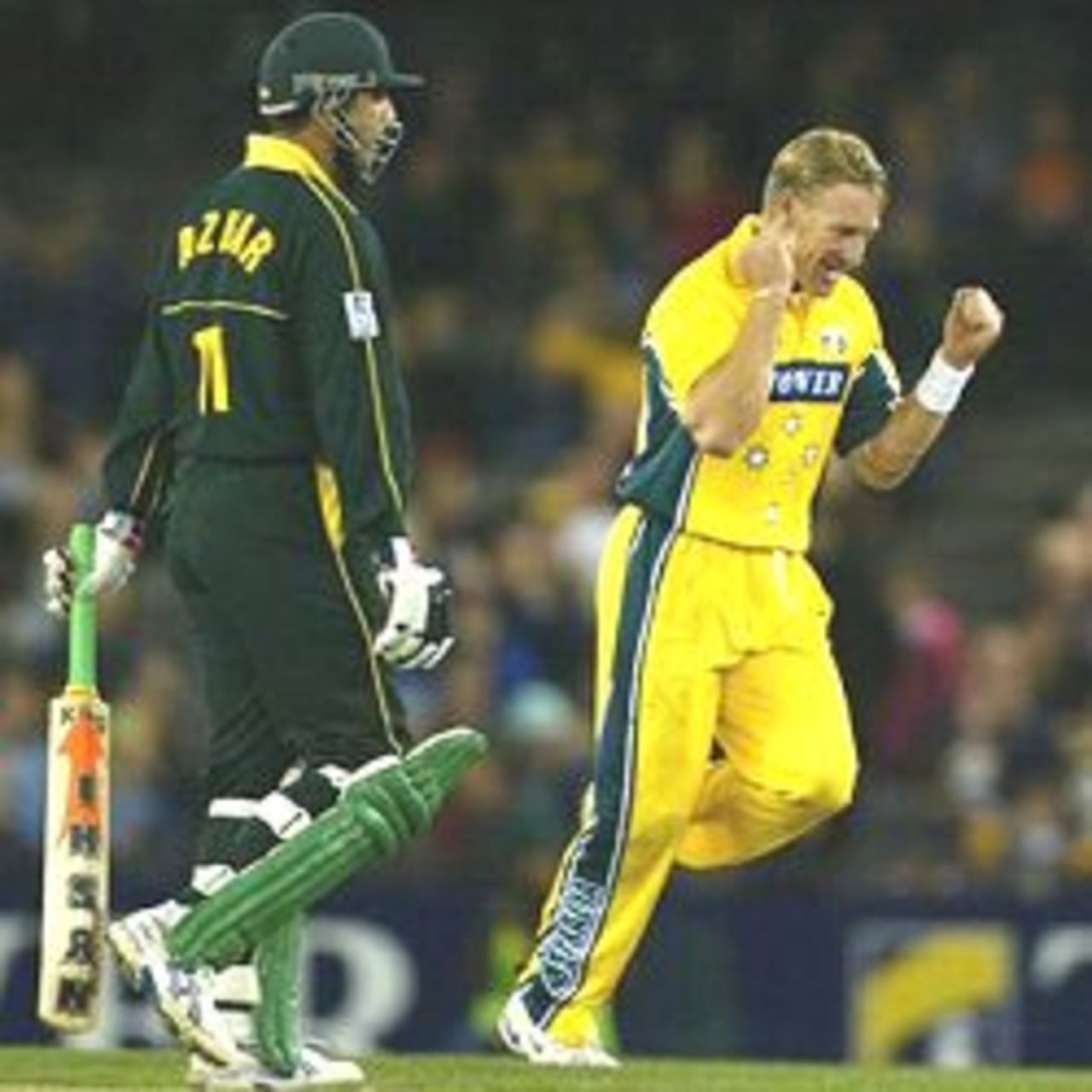 MELBOURNE - JUNE 12: Andy Bichel #34 for Australia claims the wicket of Azhar Mahmood #11 for Pakistan, during game one of the Tower Super Challenge 2 One Day International Series between Australia and Pakistan, played at Colonial Stadium, Melbourne, Australia on the 12th of June 2002.