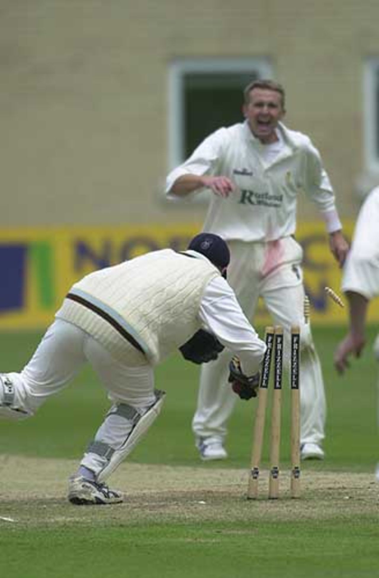 Derbyshire keeper Karl Krikken effects the run out of Nicky Boje for 10 in the Notts second innings, Notts v Derby, County Championship, 15 Jun 2002