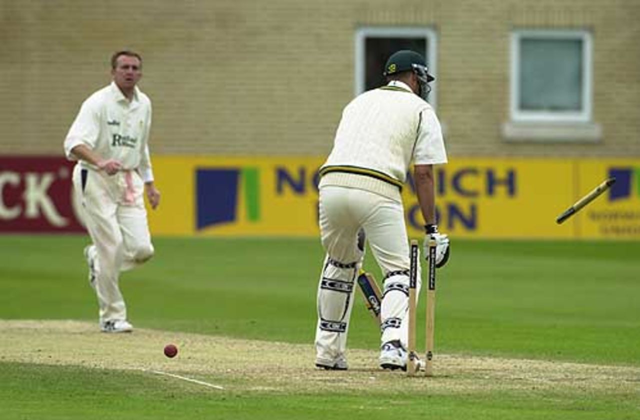 Greg Smith of Notts is clean bowled by Cork for 27 to close the Notts second innings, Notts v Derby, County Championship, 15 Jun 2002