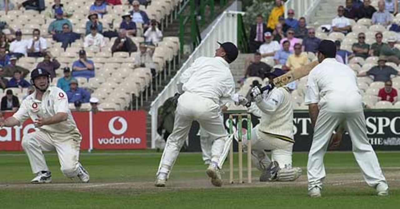 On his last Test innings in England de Silva sweeps at a ball from Ashley Giles as the close field await a chance, England v Sri Lanka, Third Test, Old Trafford, 17 Jun 2002