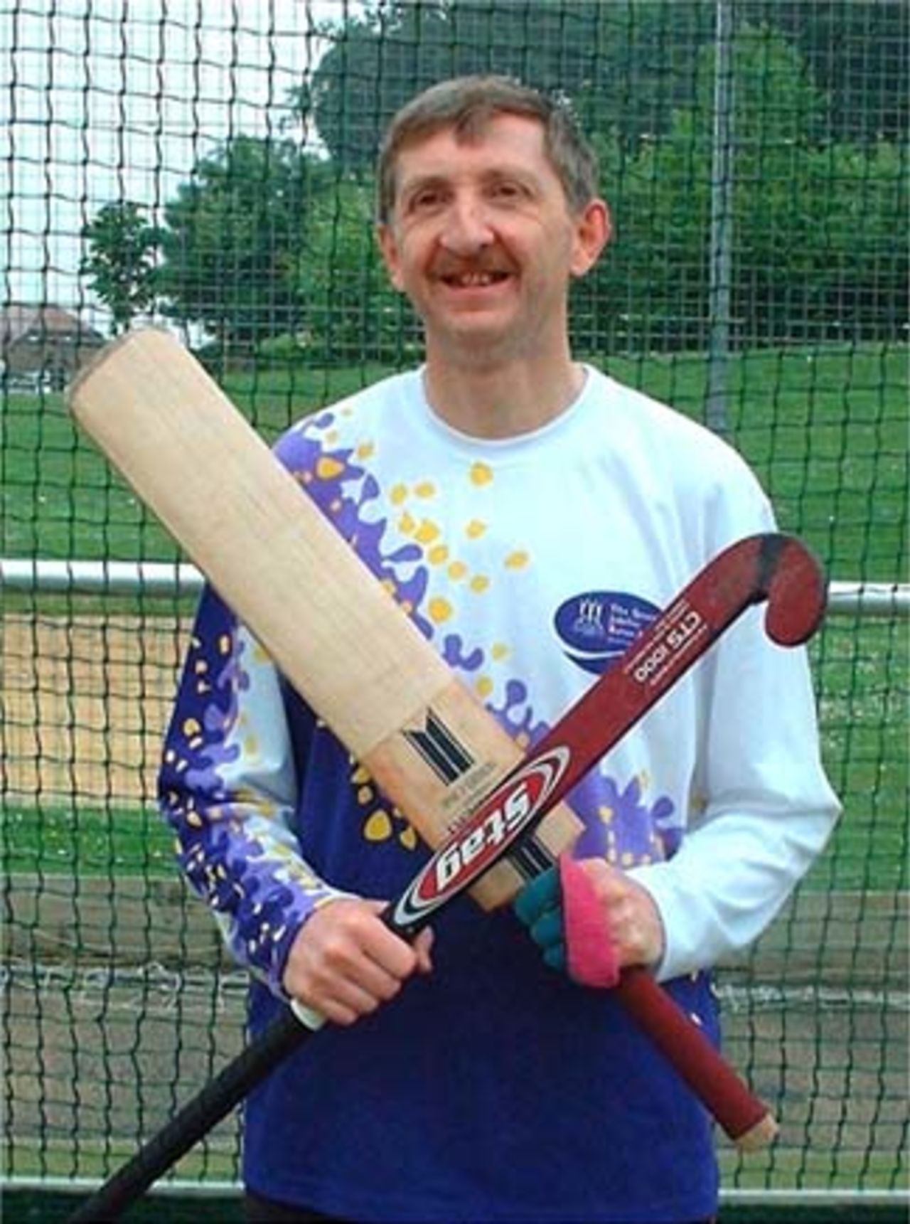 Richard Macer of Sparsholt CC, prepares to run with the Queen's baton for the Commonwealth Games 2002