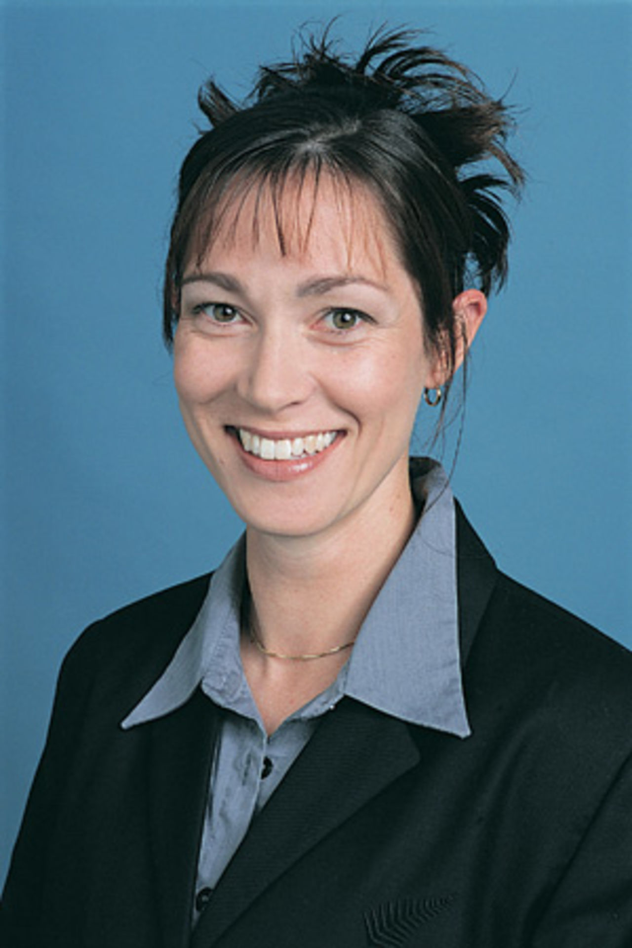 Portrait of Angela Peterson - New Zealand women's physiotherapist in the 2002 season.