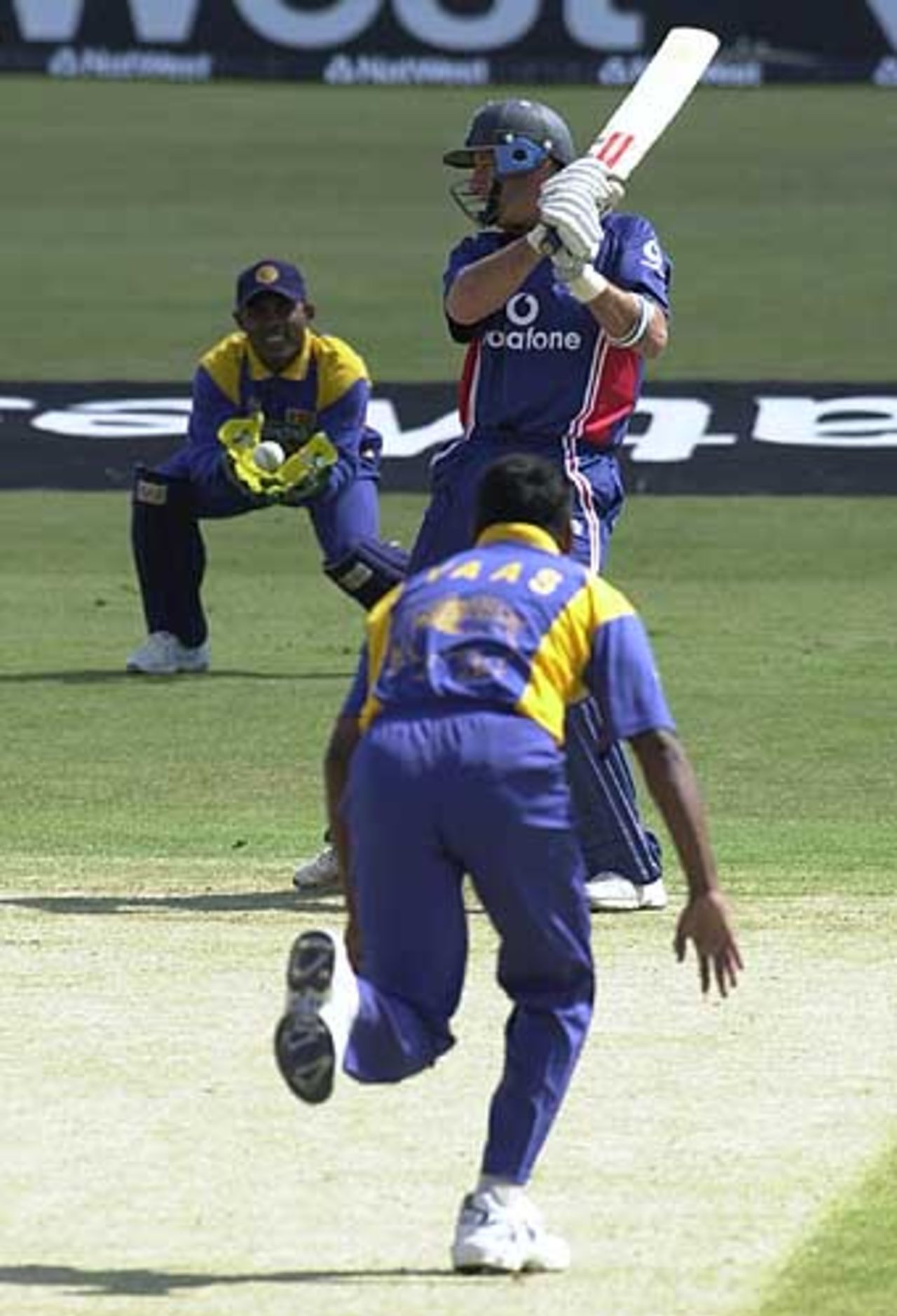 Hussain rocks onto the back foot to cut a Vaas delivery for 4, England v Sri Lanka at Trent Bridge