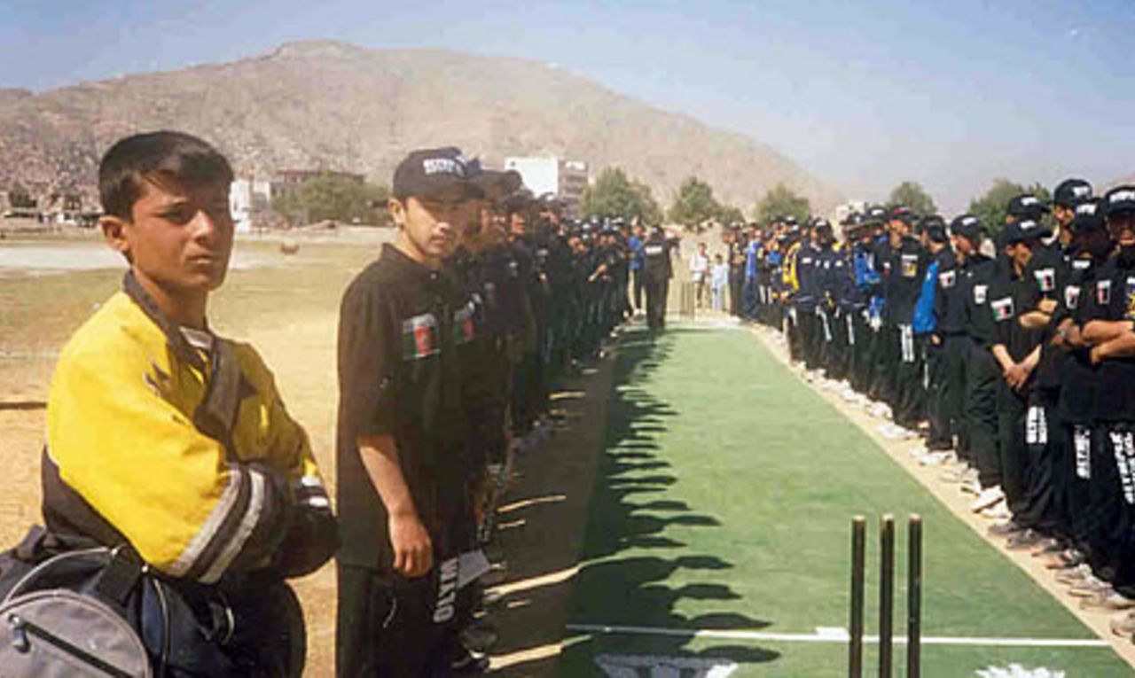 Teams lined-up during inauguration ceremony of the first Olympia Lube Oil Cricket Tournament held in Kabul, 5 - 20 May 2003. 14 teams from all over Afghanistan particpated.