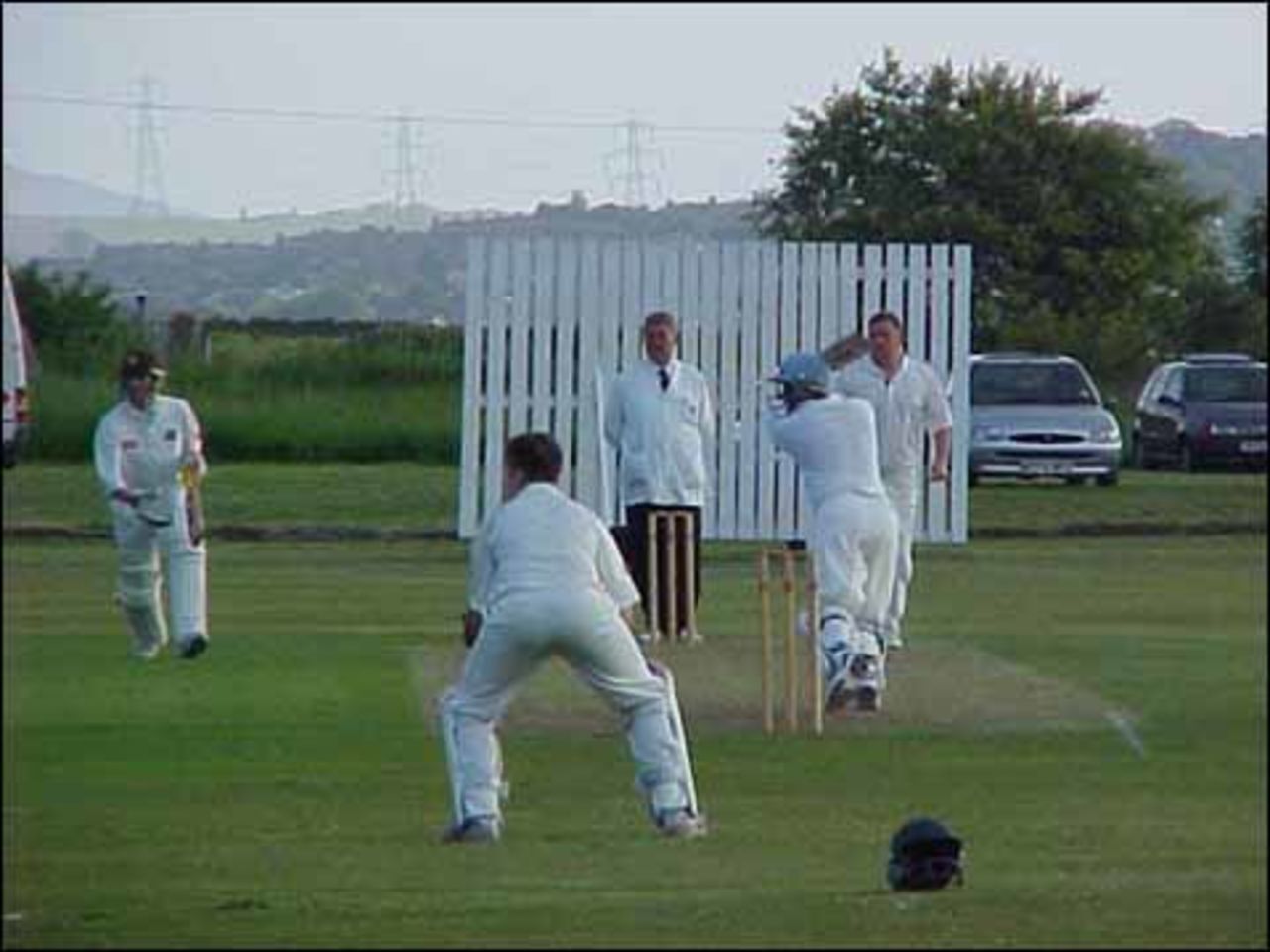 Andy Barker hit a timely unbeaten 65 as Enfield beat Oldham to reach the Inter League Trophy semi finals.