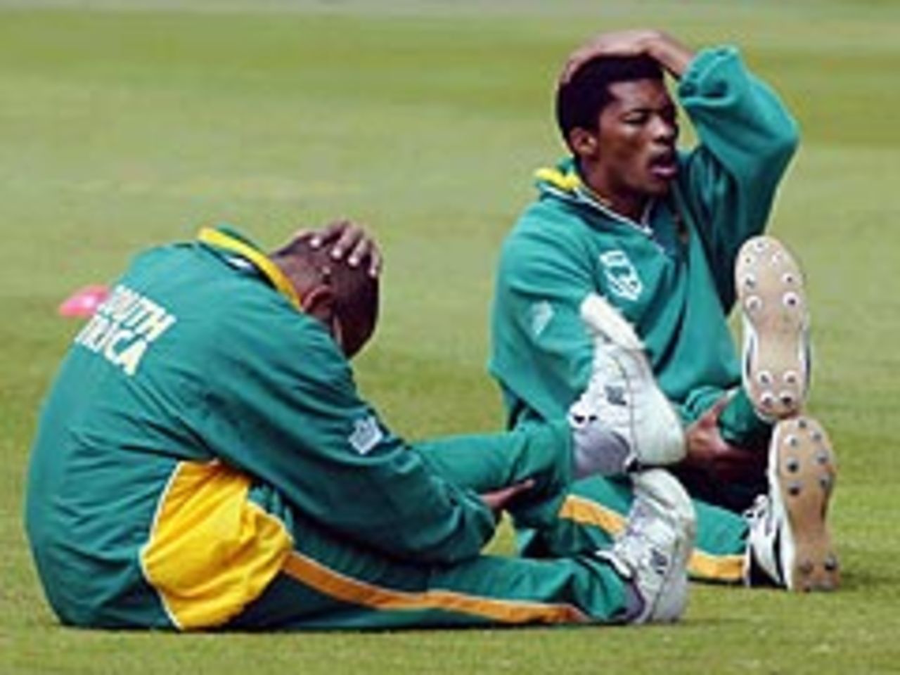 Makhaya Ntini and Paul Adams warm up ahead of South Africa's match against Sussex on Friday