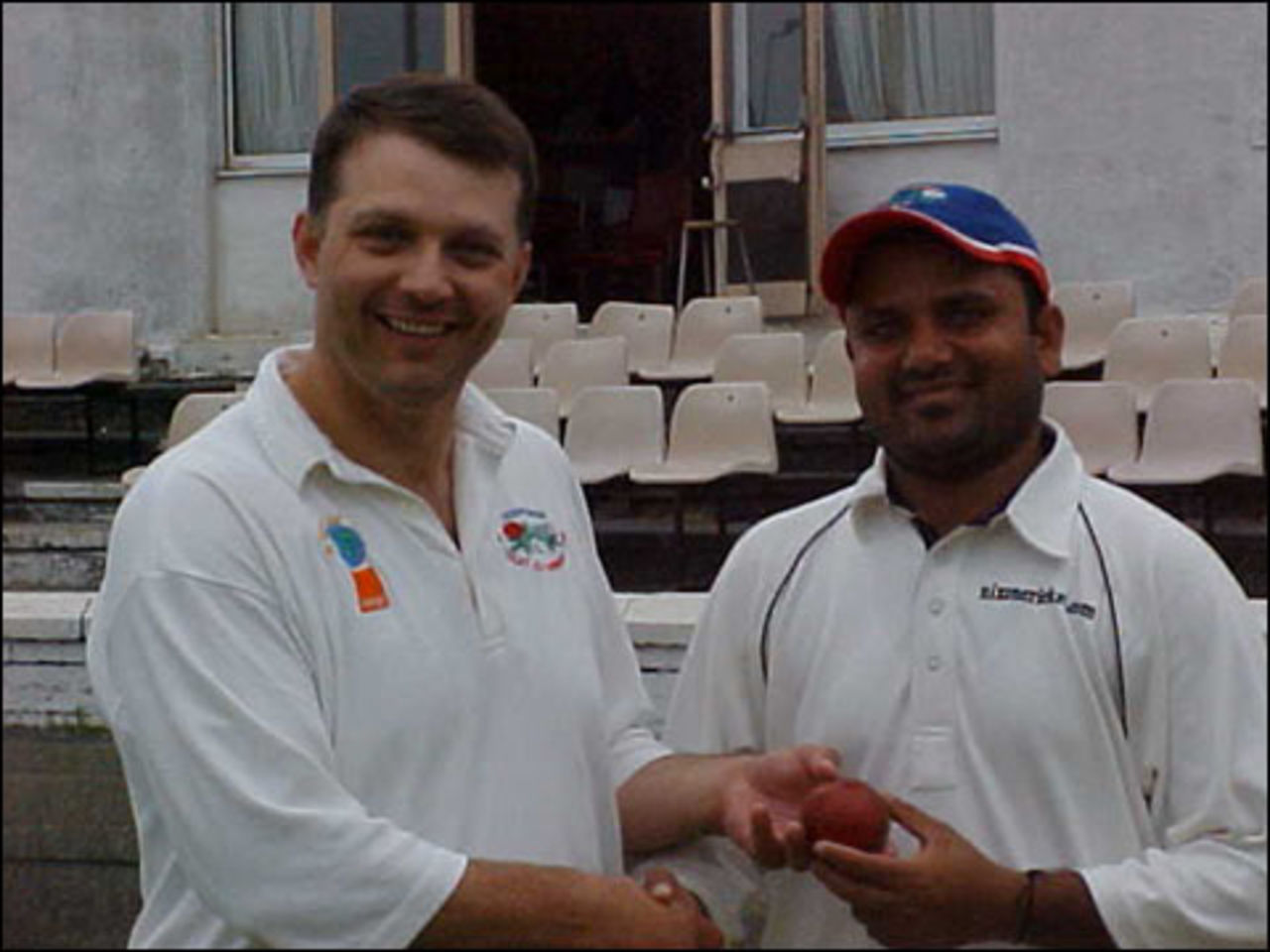 Todmorden captain Mark Clayton with Gyan Pandey after his match winning preformance at Accrington when he took 9-74 and scored 80 not out